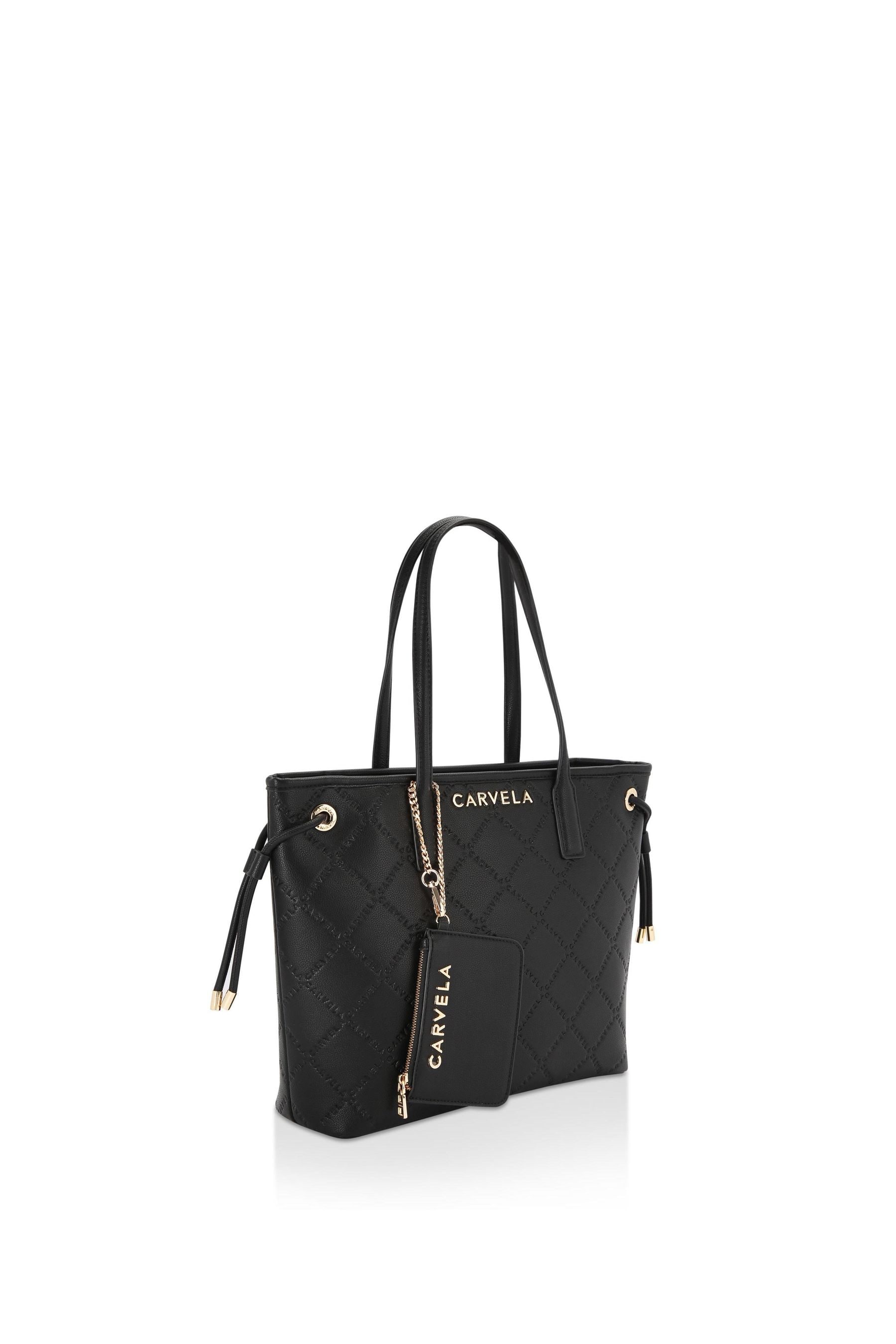 Carvela ola clutch bag top