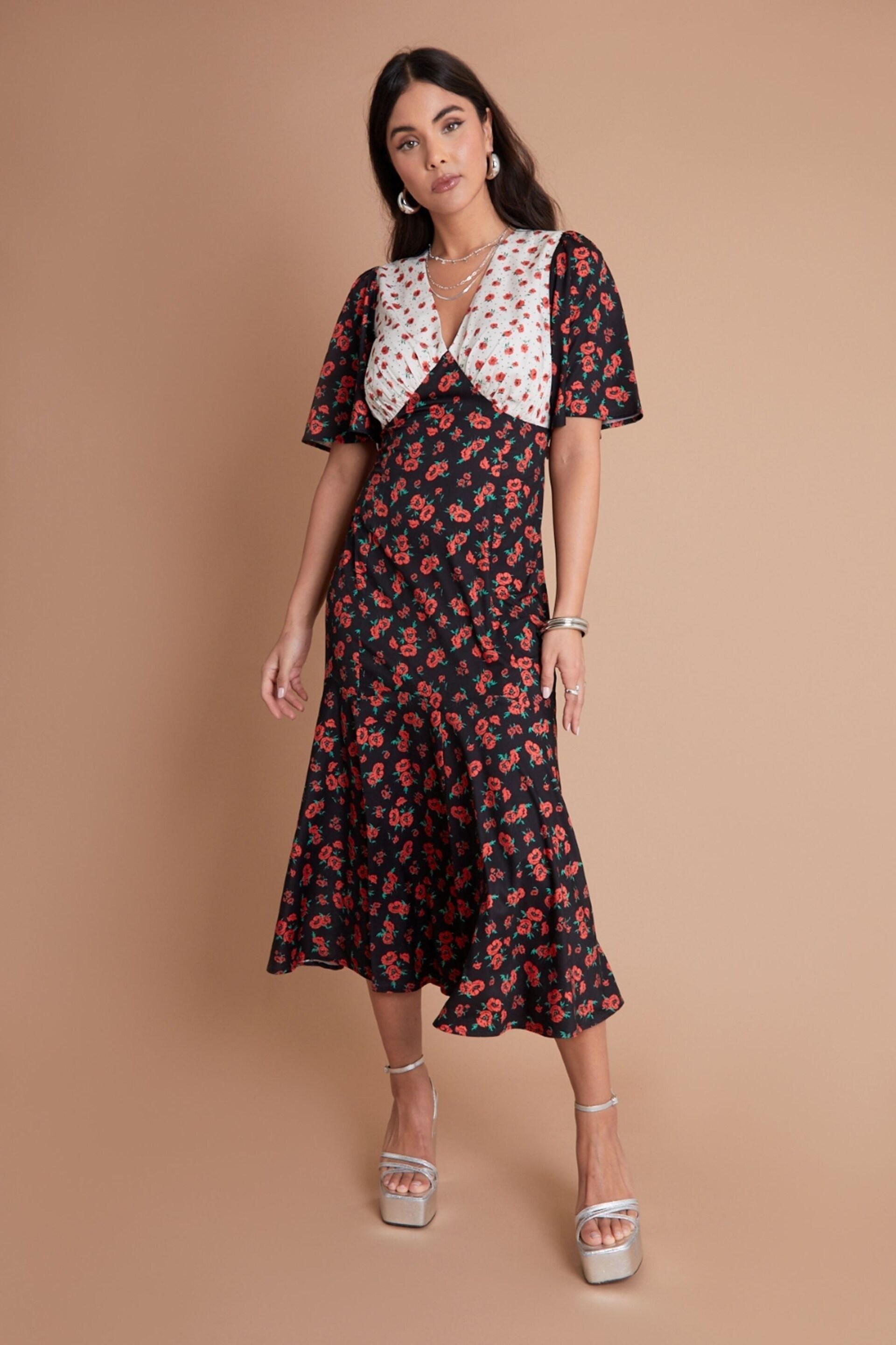 Another Sunday Mix Print Flutter Sleeve Black and Ecru Ditsy Floral Midi White Dress - Image 1 of 3
