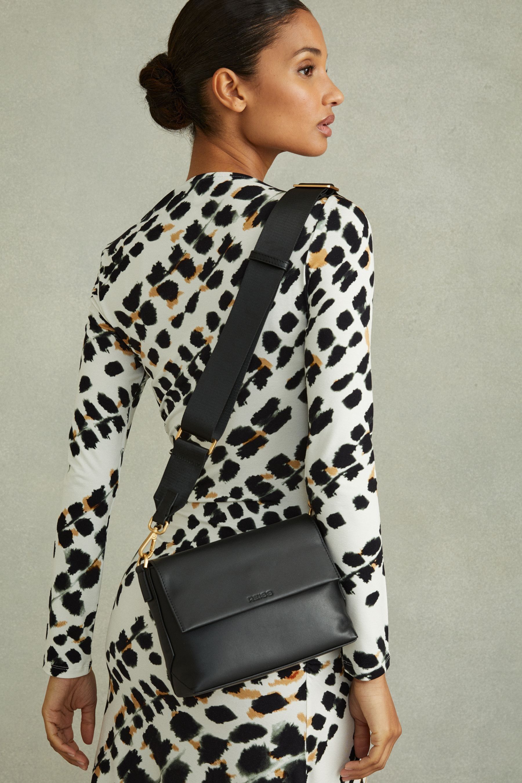 Buy Reiss Black Selena Leather Adjustable Strap Crossbody Bag from the Next UK online shop