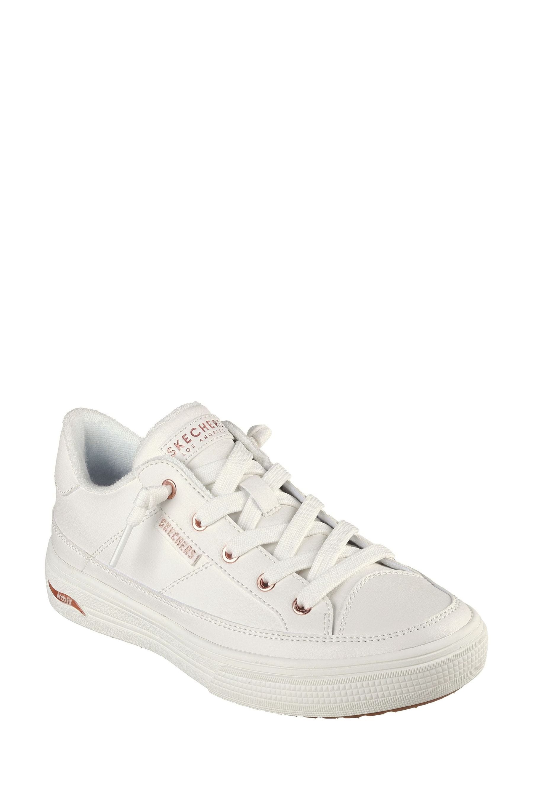 Skechers white canvas shoes online