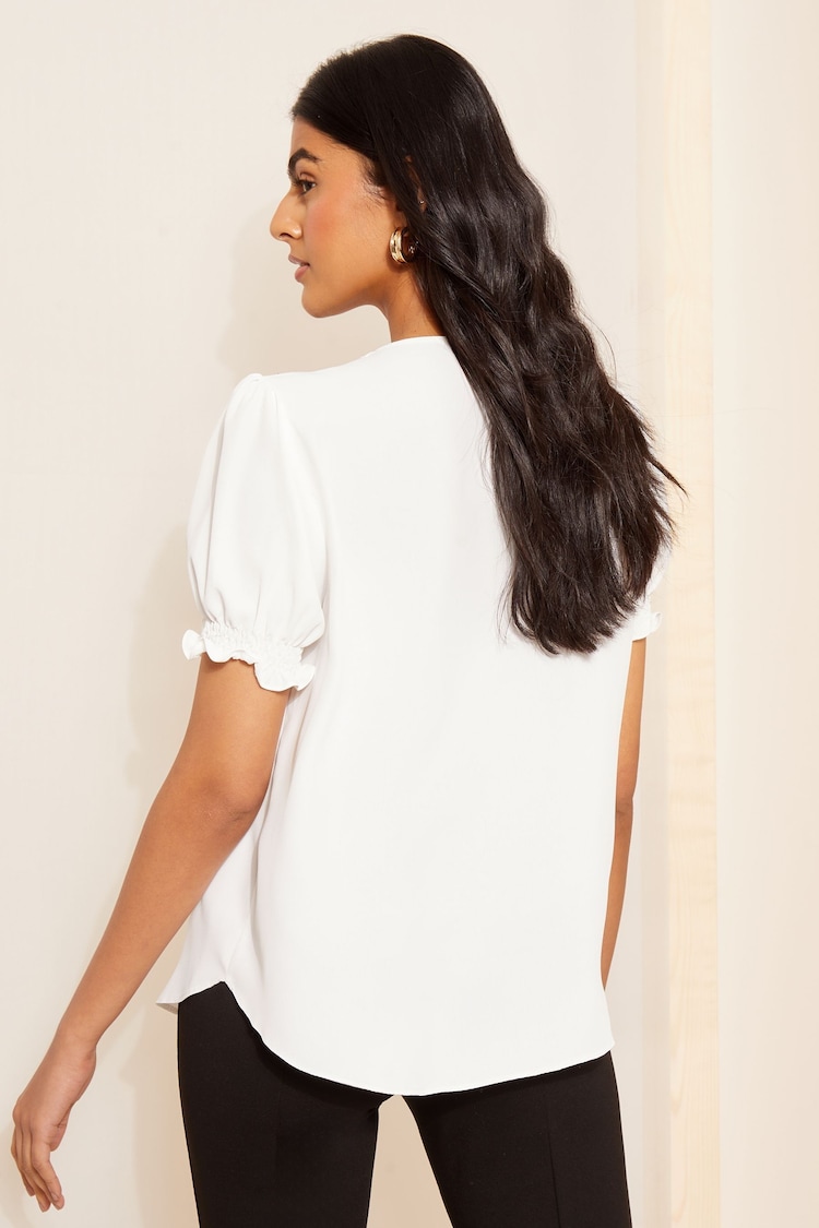 Friends Like These White Tipped Ruffle Front Puff Sleeve Blouse - Image 4 of 4