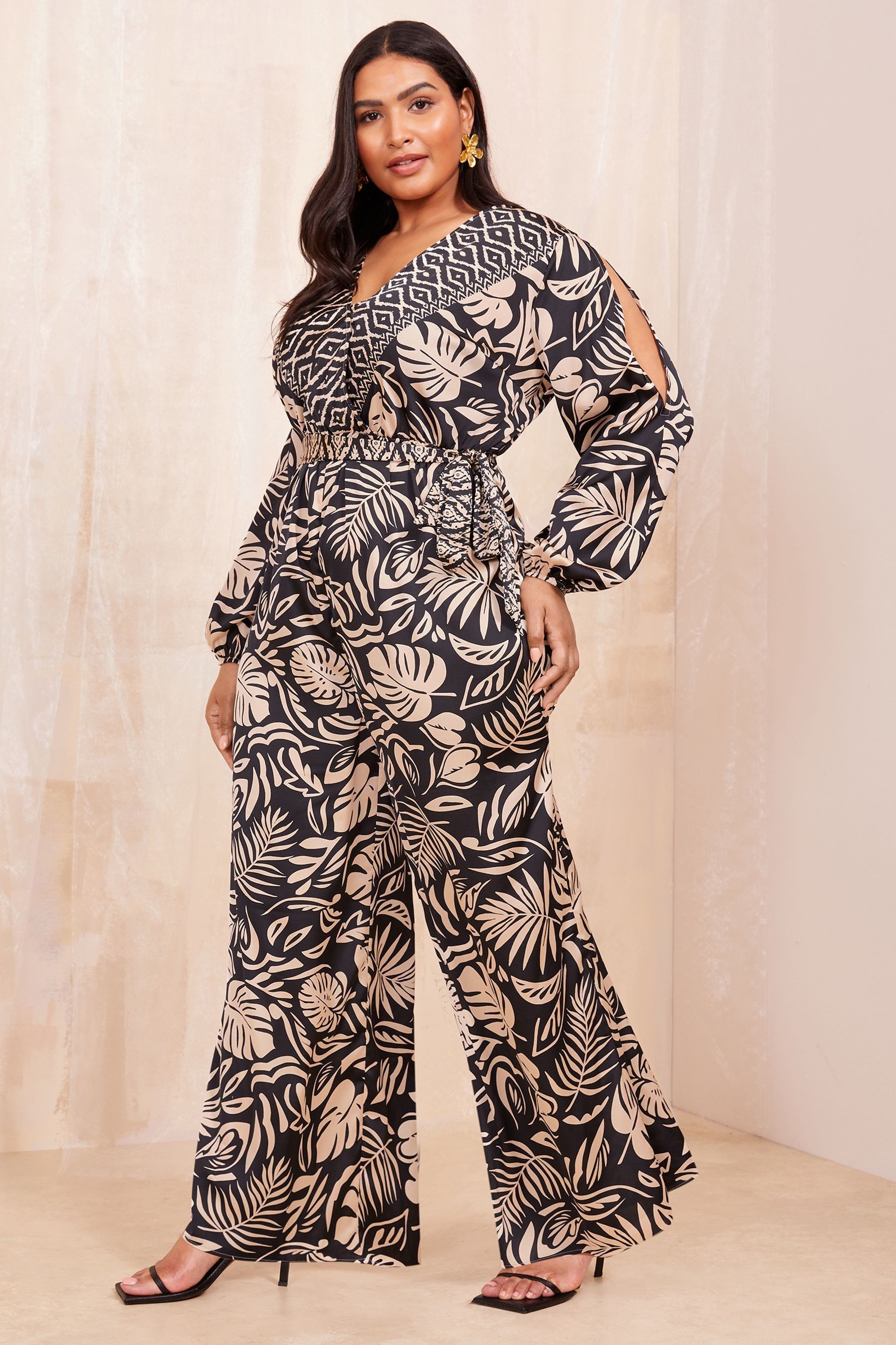Buy Curves Like These Black White Long Sleeve Wrap Jumpsuit from Next Malaysia