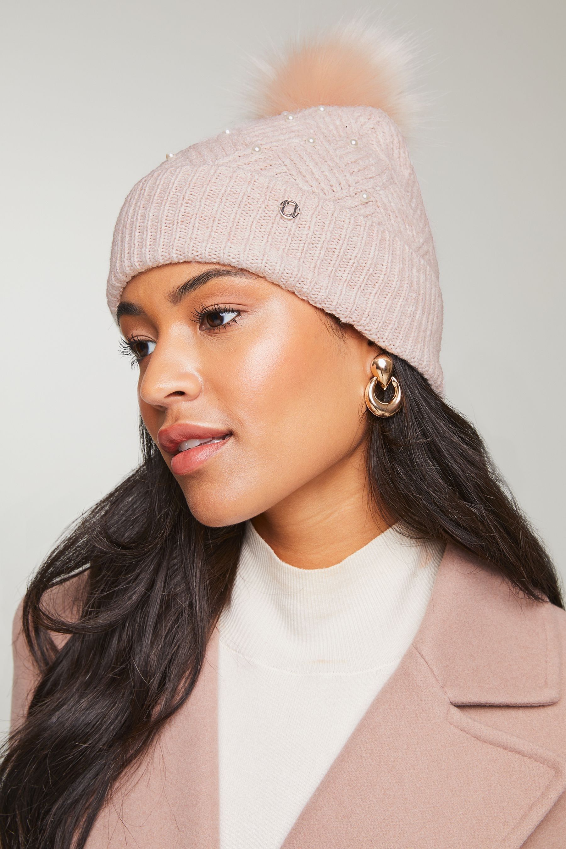 Buy Lipsy Pink Cosy Pearl Detailing Pom Beanie Hat from the Next UK online shop