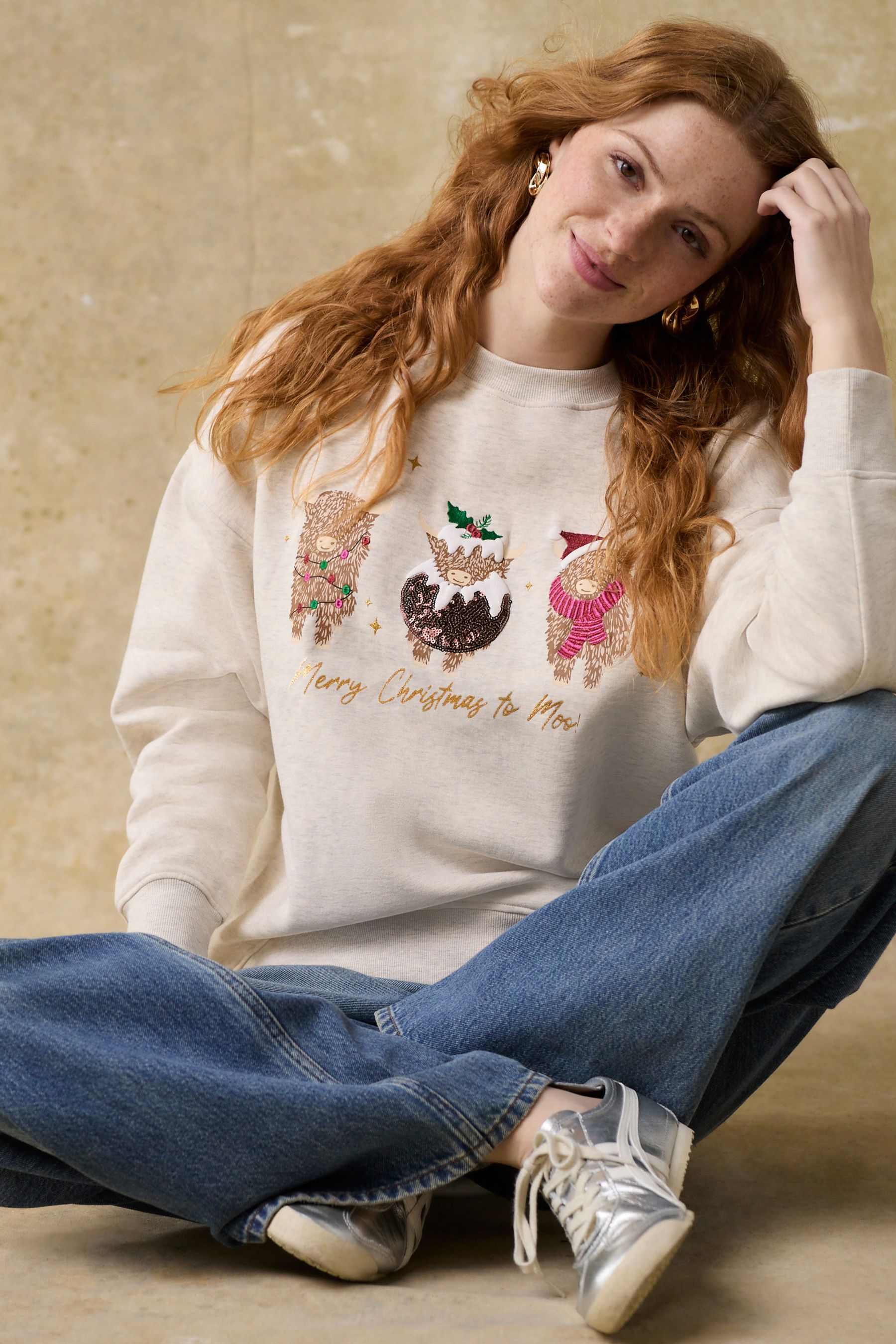 Buy Oatmeal Marl Christmas Hamish The Highland Cow Fun Festive Novelty Front Graphic Crew Neck Sweatshirt from the Next UK online shop