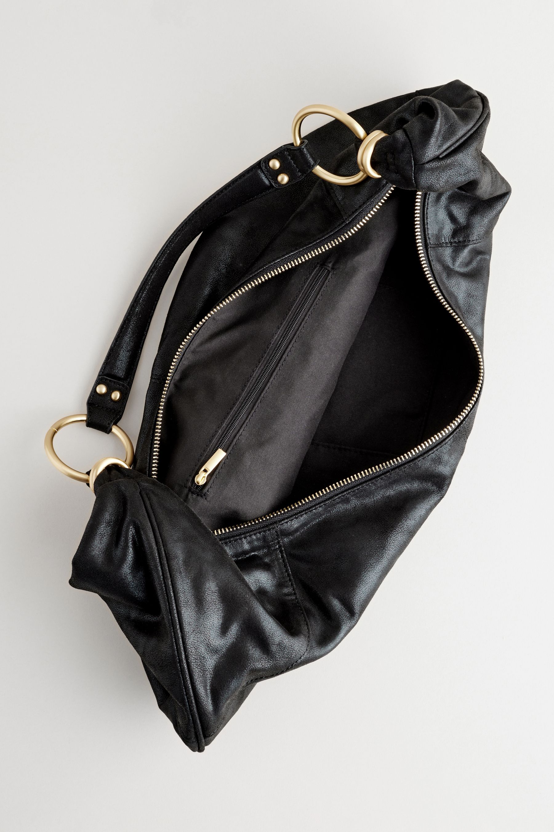 Black oversized ring front slouch bag sales