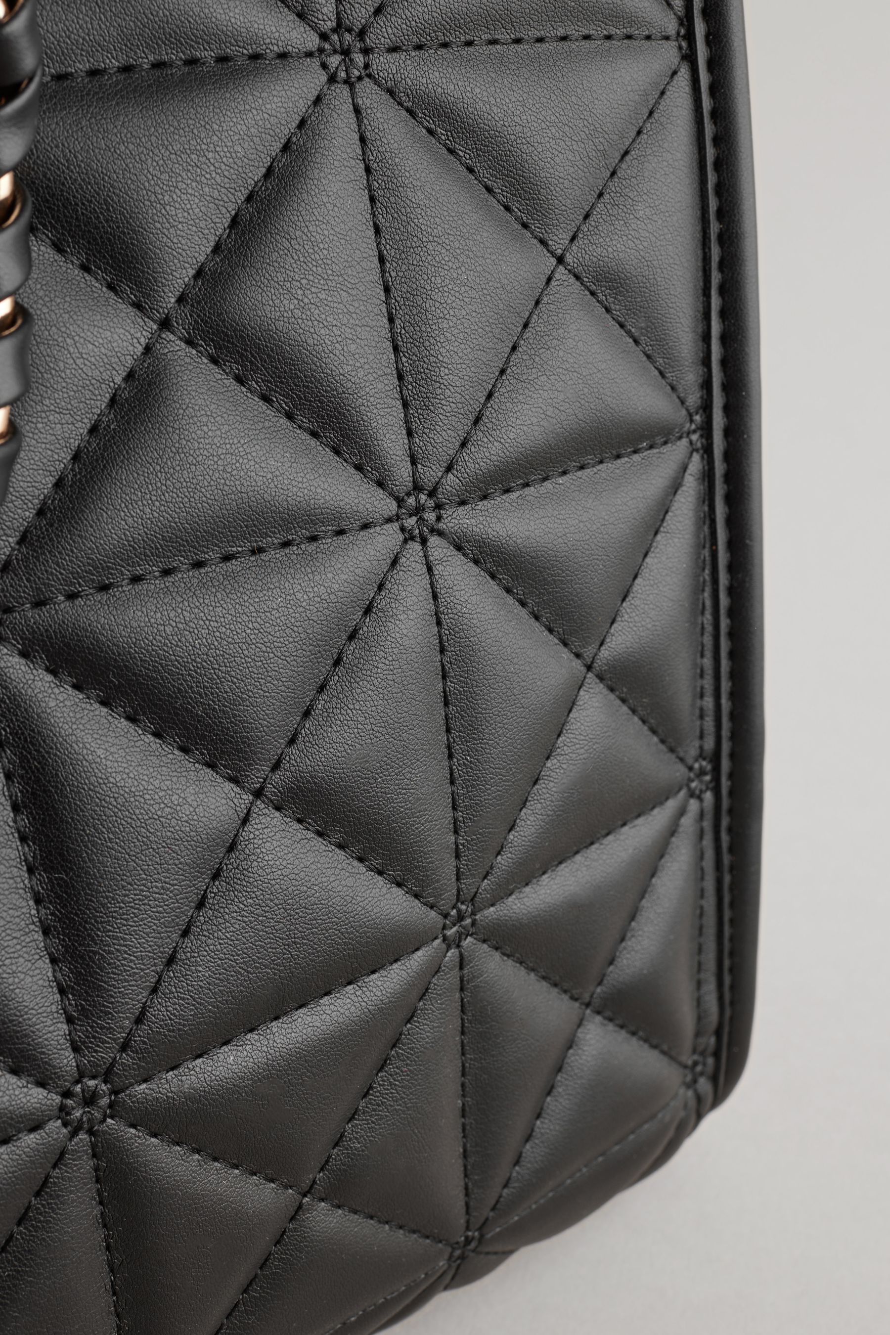 Black quilted handbag online