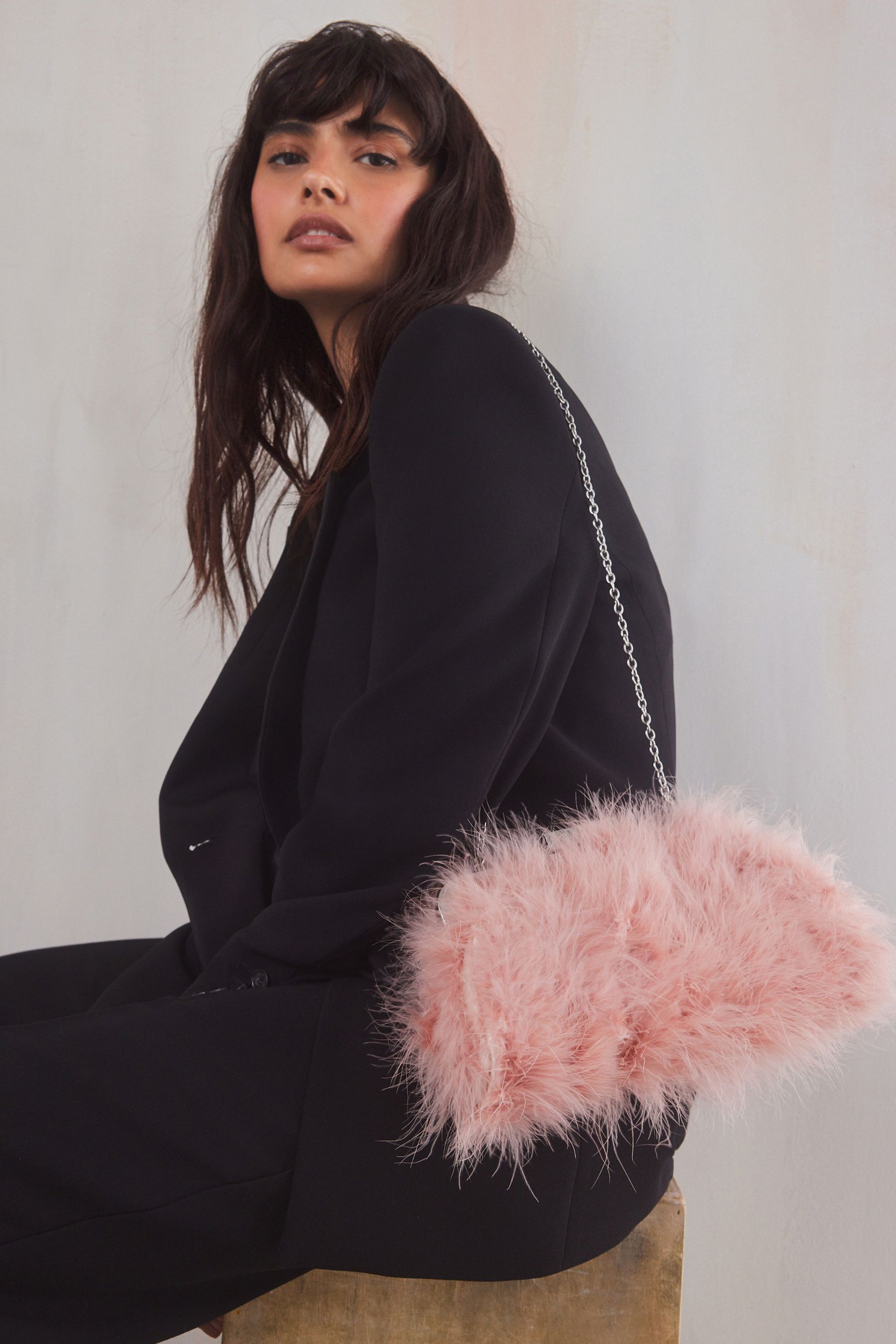 Pink feather clutch bag on sale