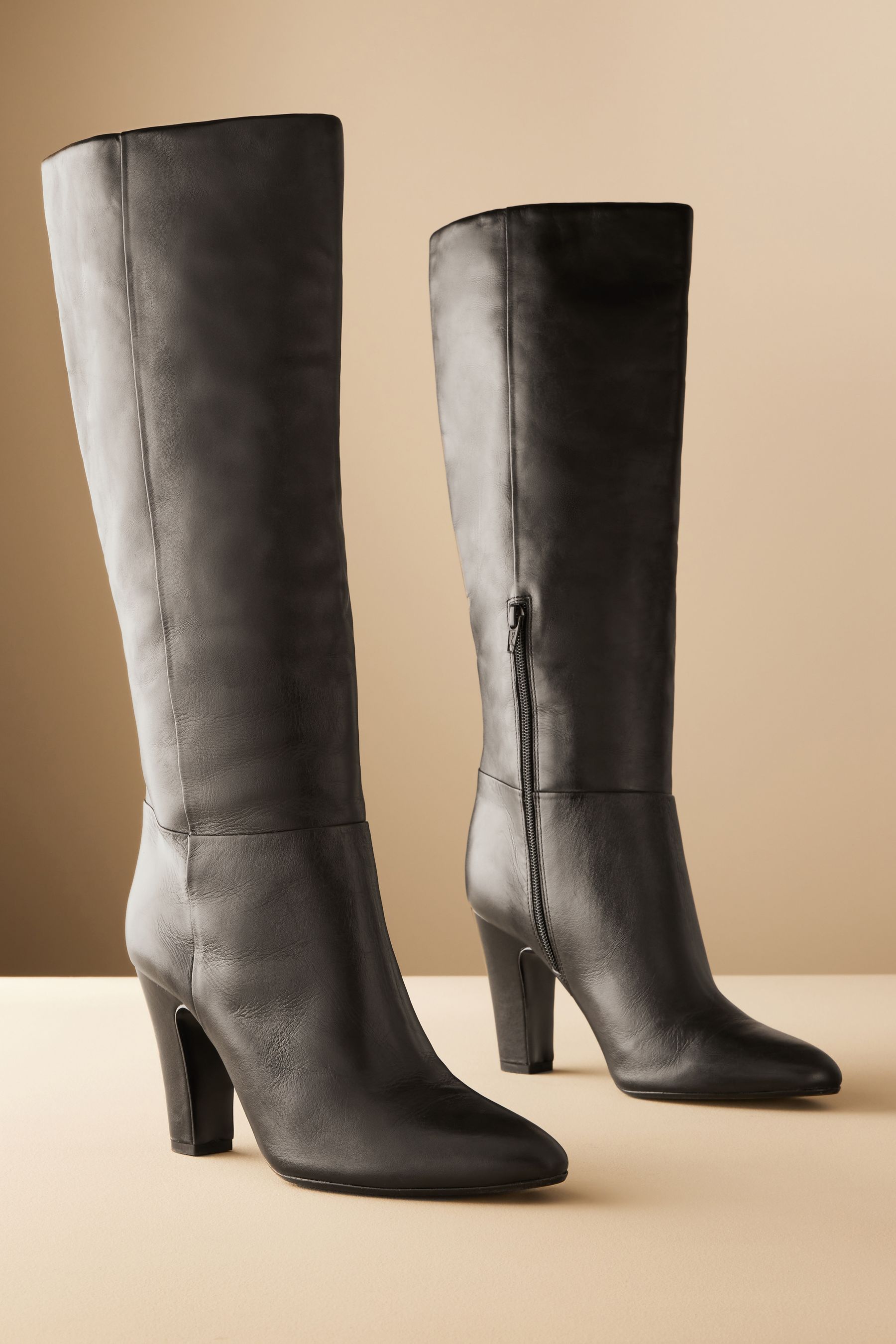 Buy Black Leather Premium Knee High Heeled Boots from the Next UK online shop