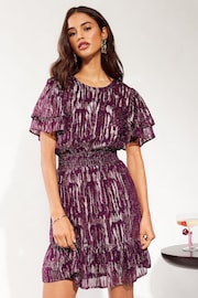 Friends Like These Purple Petite Zebra Metallic Ruffle Sleeve Mini Dress - Image 1 of 4