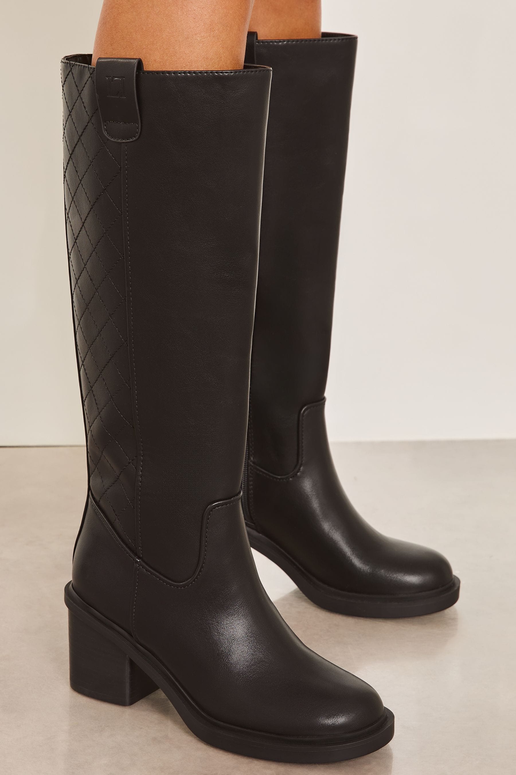 Buy Lipsy Black Mid Block Heel Knee High Chunky Quilted Panel Faux Leather Pull On Boot from the Next UK online shop
