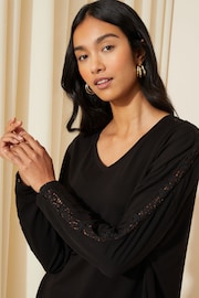 Friends Like These Black Crochet Petite Soft Jersey V Neck Long Sleeve Tunic Top - Image 2 of 4