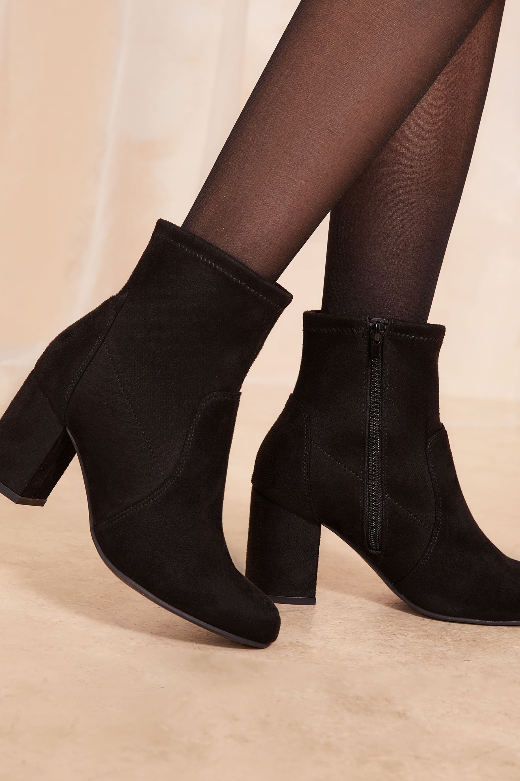 Mid block heel sock boots 2025