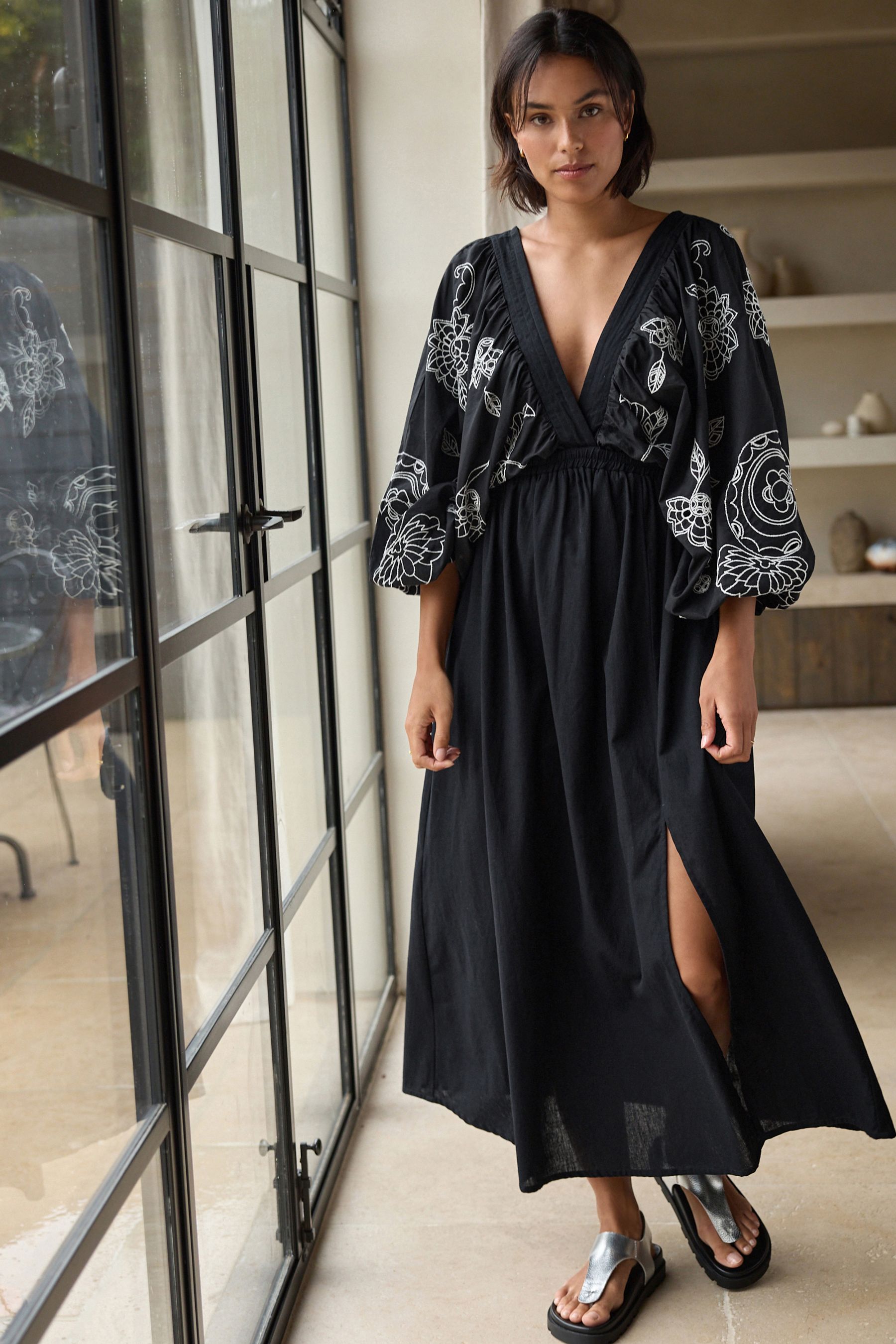 White and black embroidered dress on sale