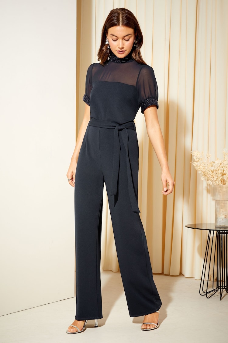 Friends Like These Navy Blue High Neck Short Sleeve Sequin Trim Jumpsuit - Image 1 of 4