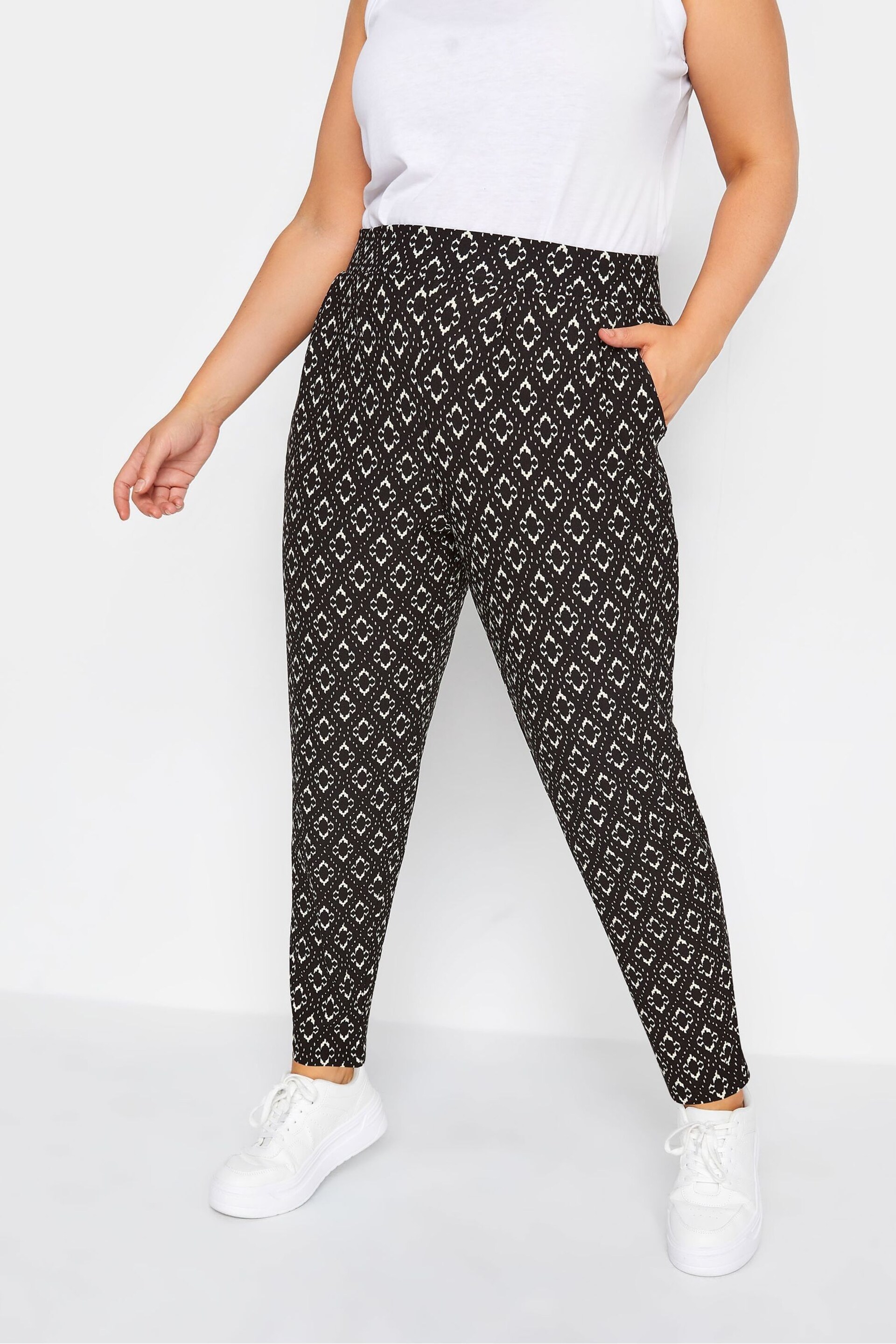 Yours Curve Black Abstract Double Pleated Harem Trousers - Image 1 of 3