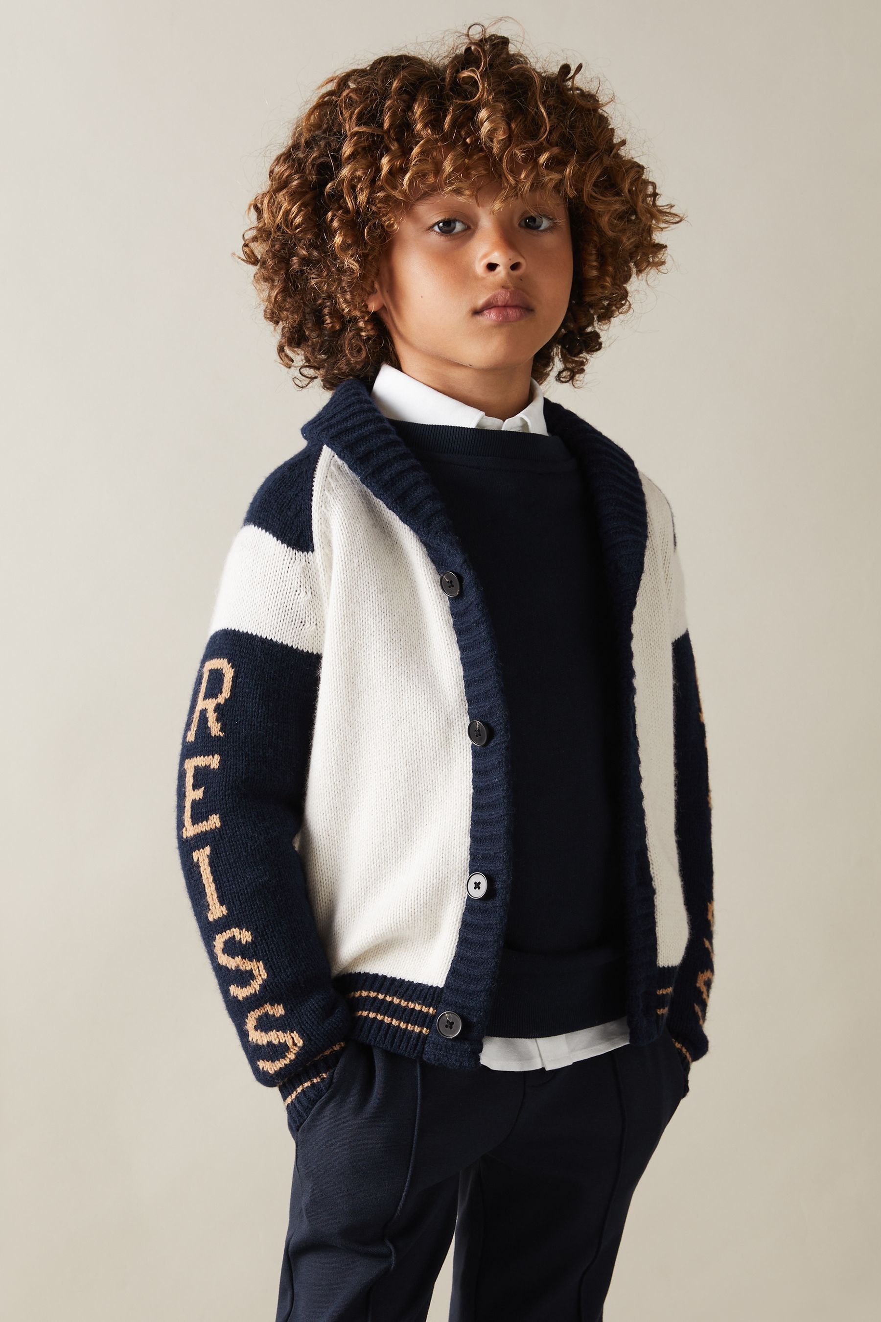 Buy Reiss Off White Navy Huston 9 13 yrs Knitted Varsity Cardigan from the Next UK online shop