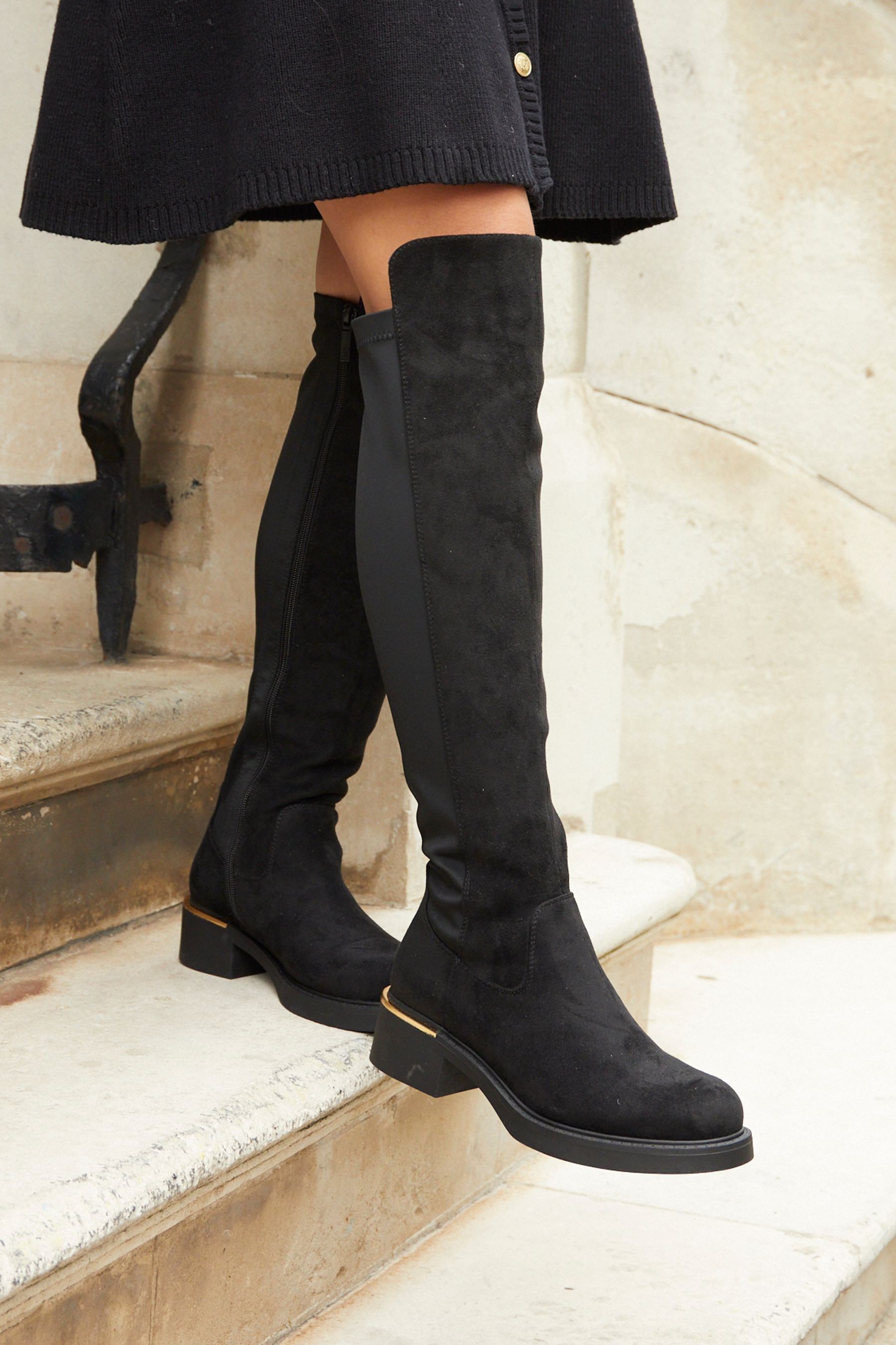 Tall boots with stretch back best sale