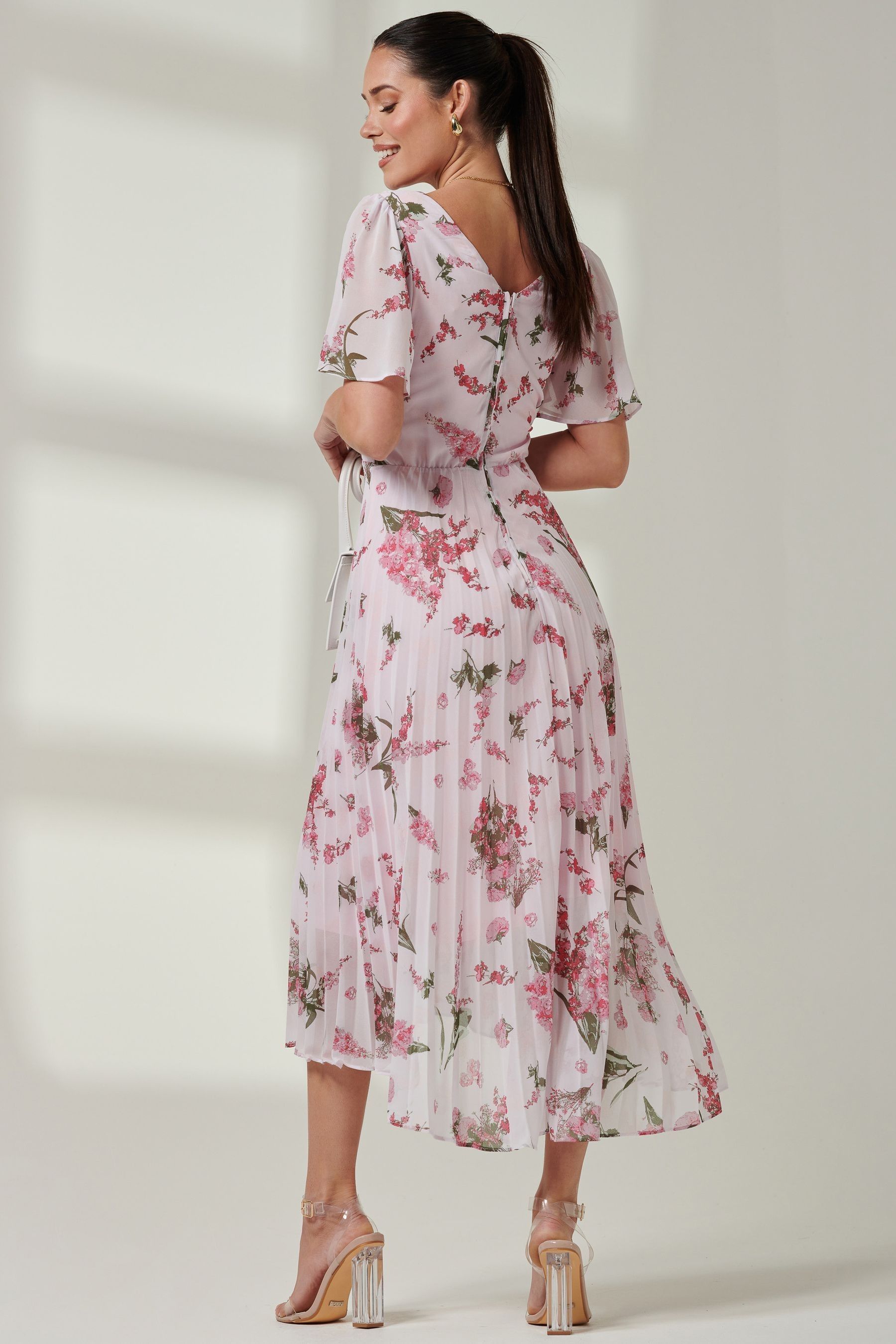 Pleated dip hem dress deals