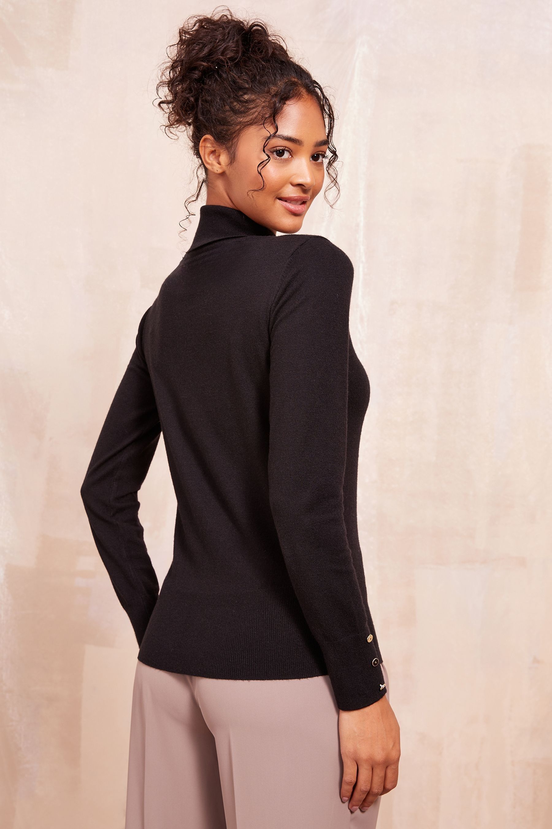 Roll neck jumper with blazer top