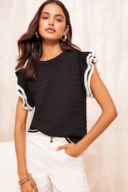 Friends Like These Black Ruffle Sleeve Knit Top - Image 1 of 4