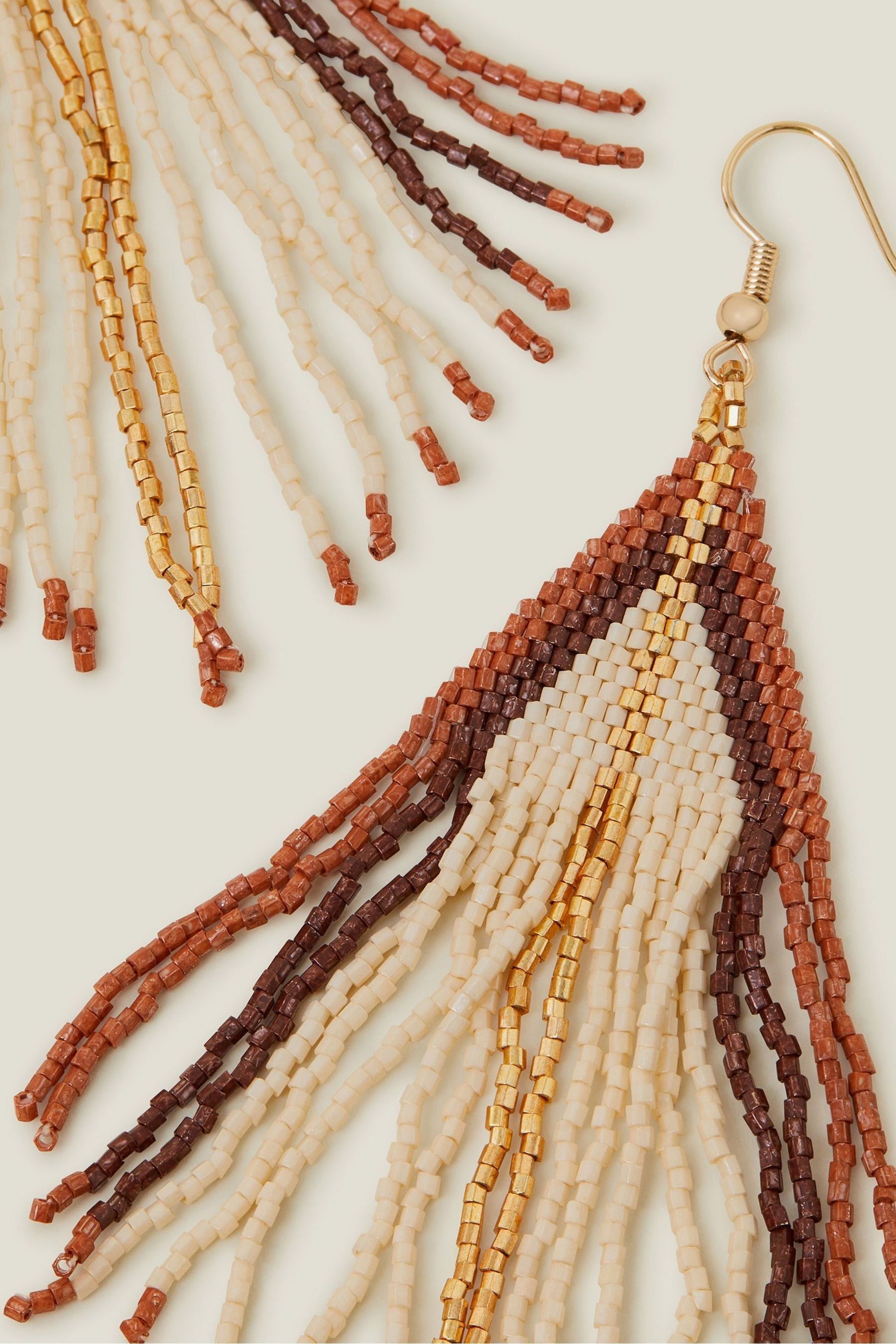 Orange earrings next on sale