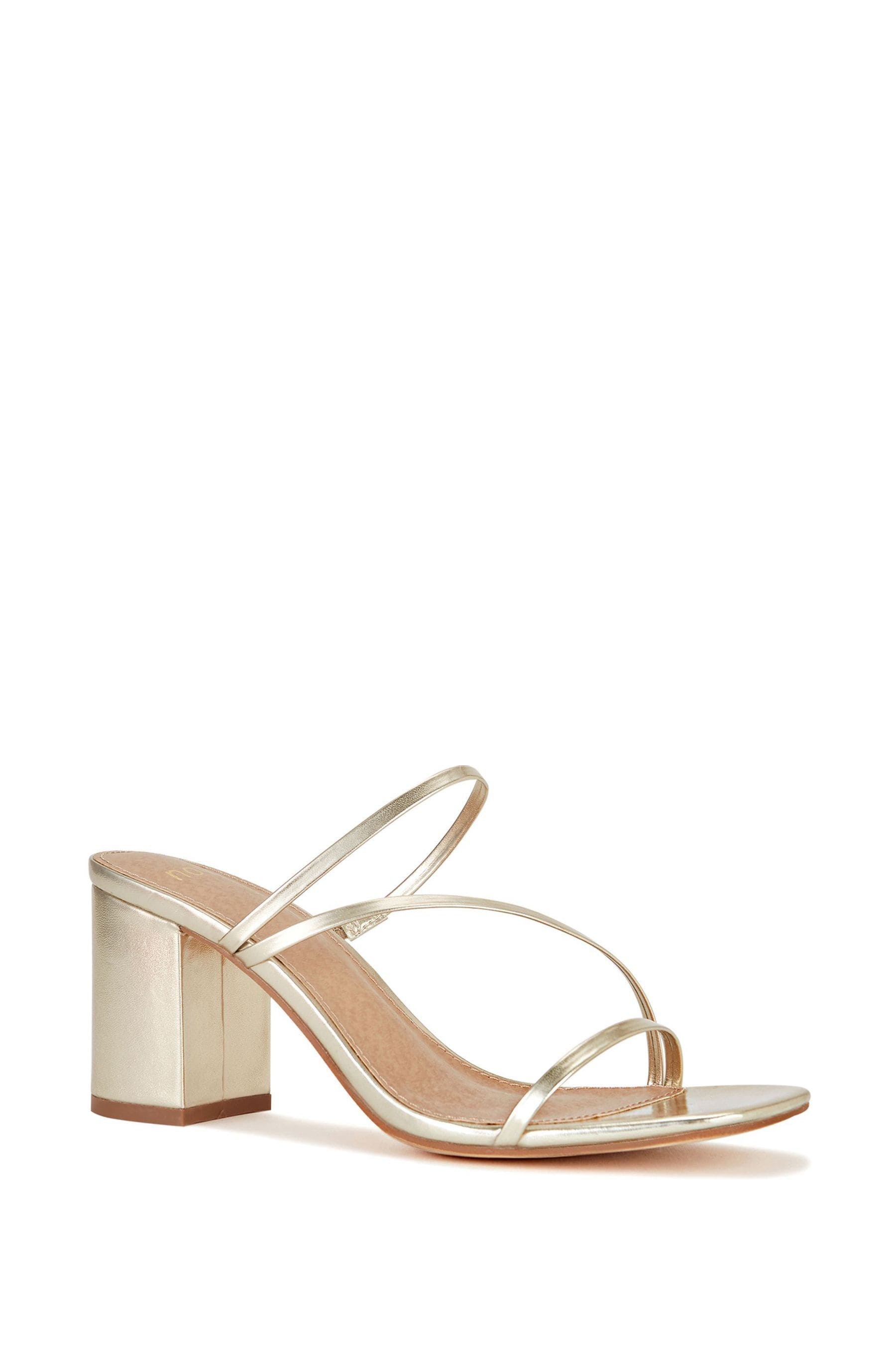 Strappy block heel mules top