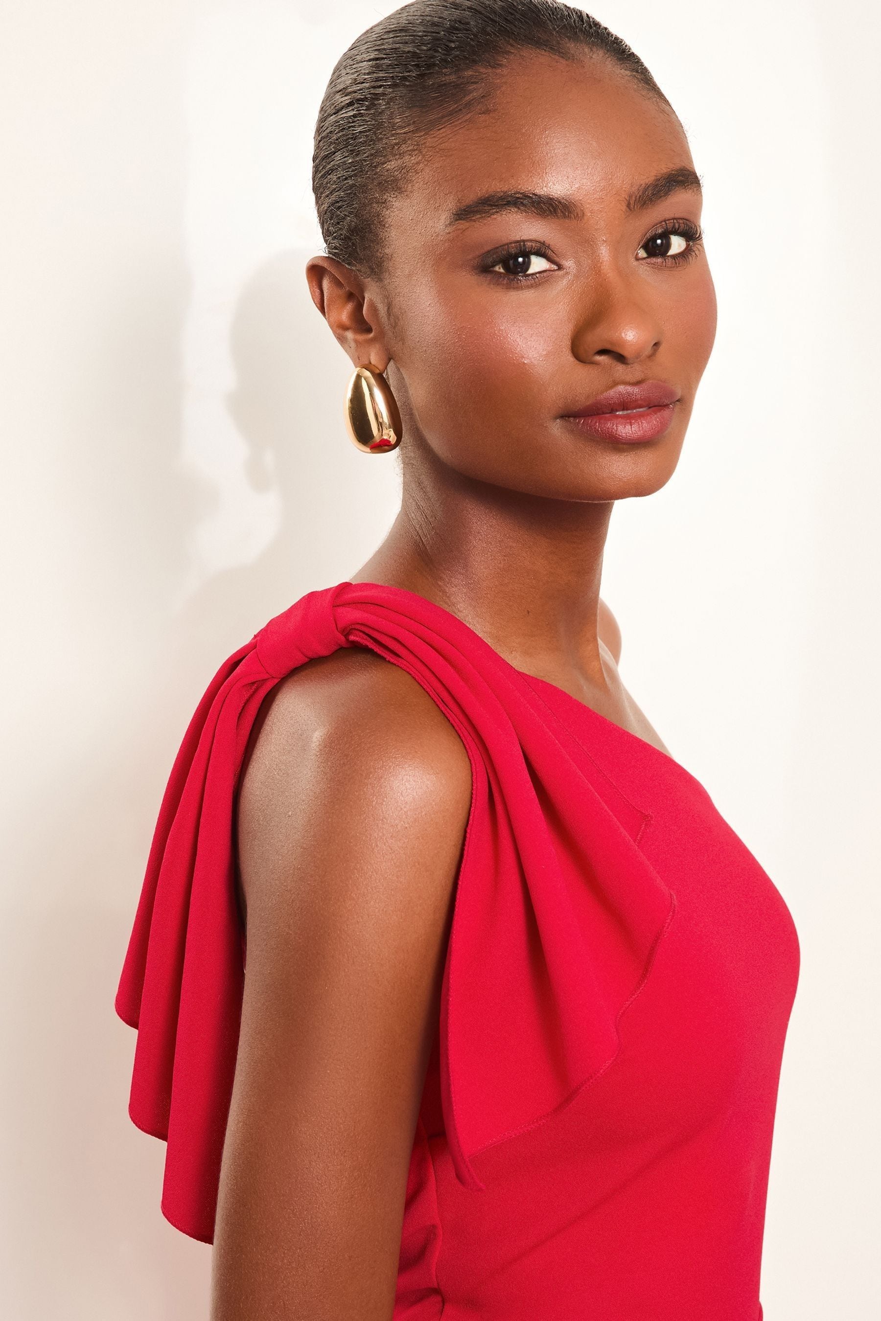Buy Lipsy Red Petite One Shoulder Bow Detail Maxi Dress from Next United Arab Emirates
