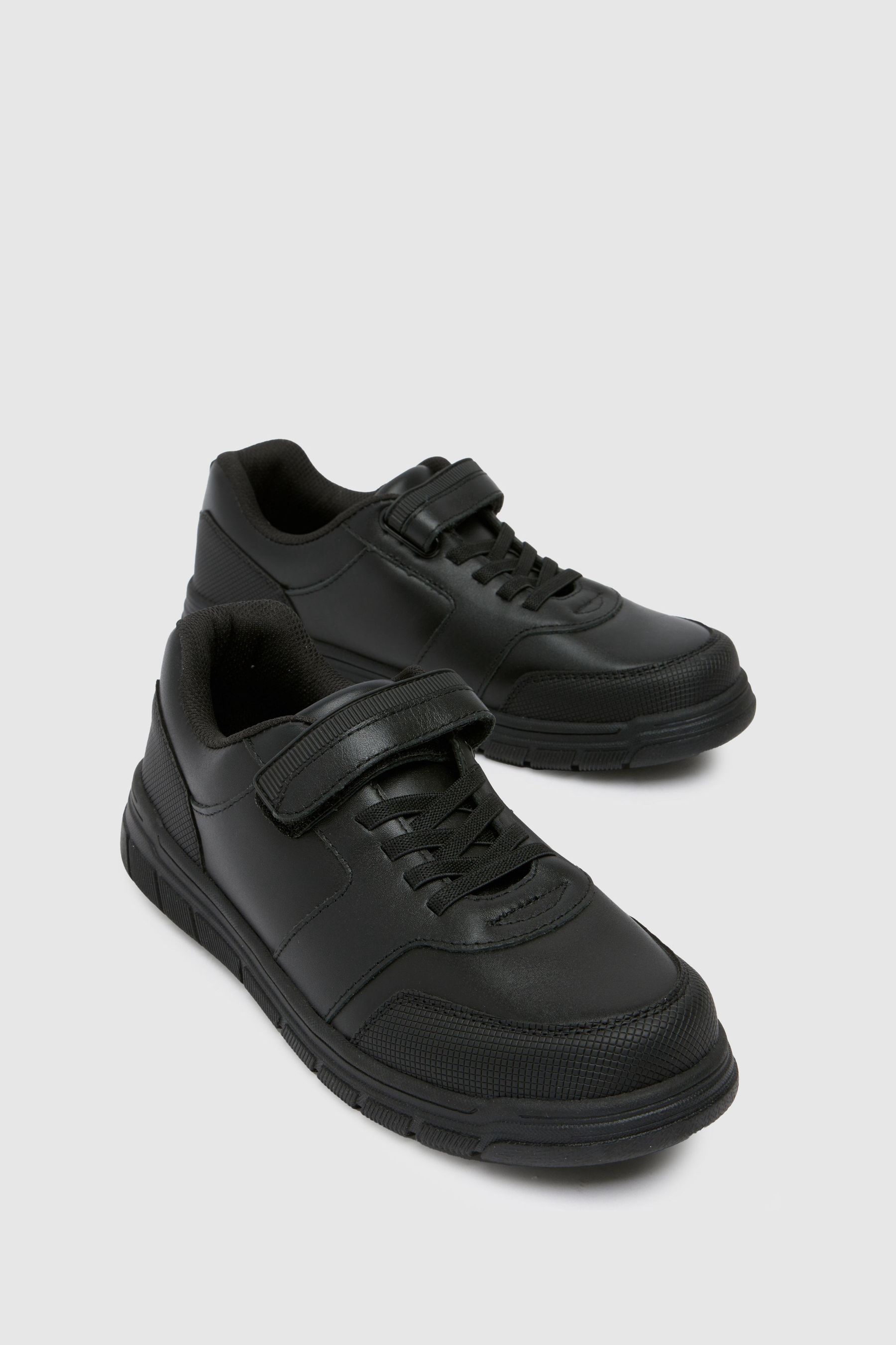 Next black trainers sales