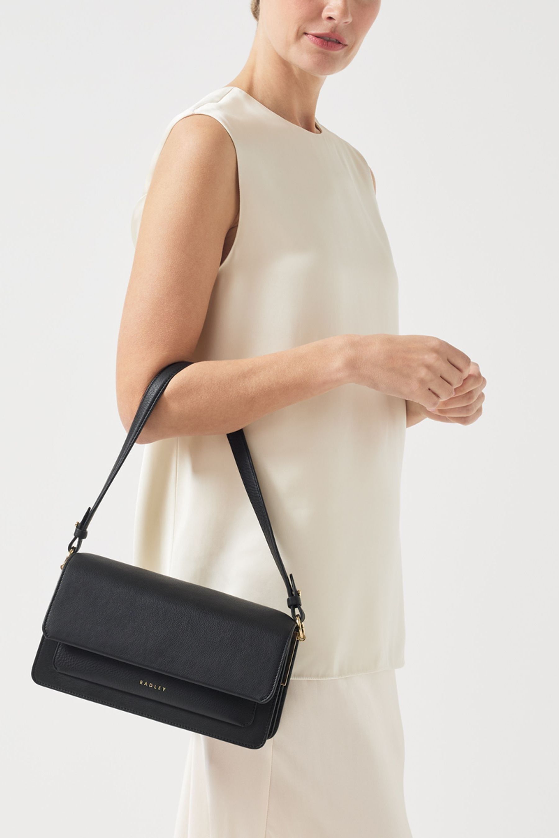Flapover shoulder bag sales