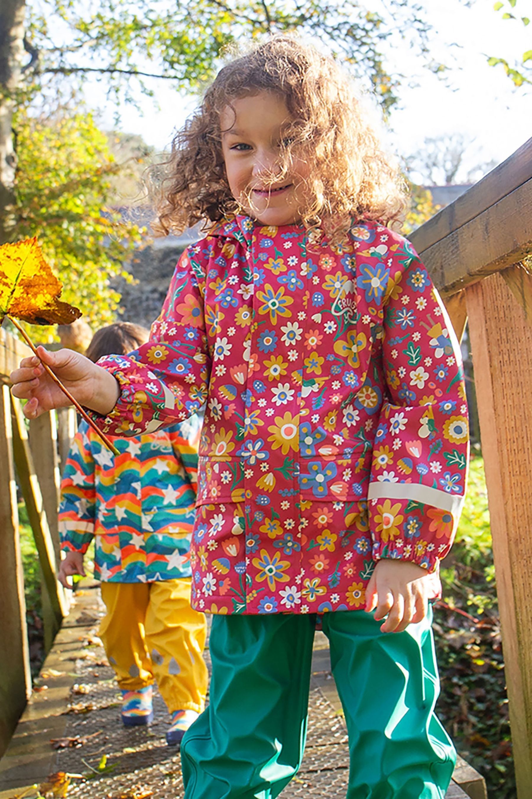 Buy Frugi Girls Pink Printed Flowers Puddle Buster Waterproof Coat from the Next UK online shop
