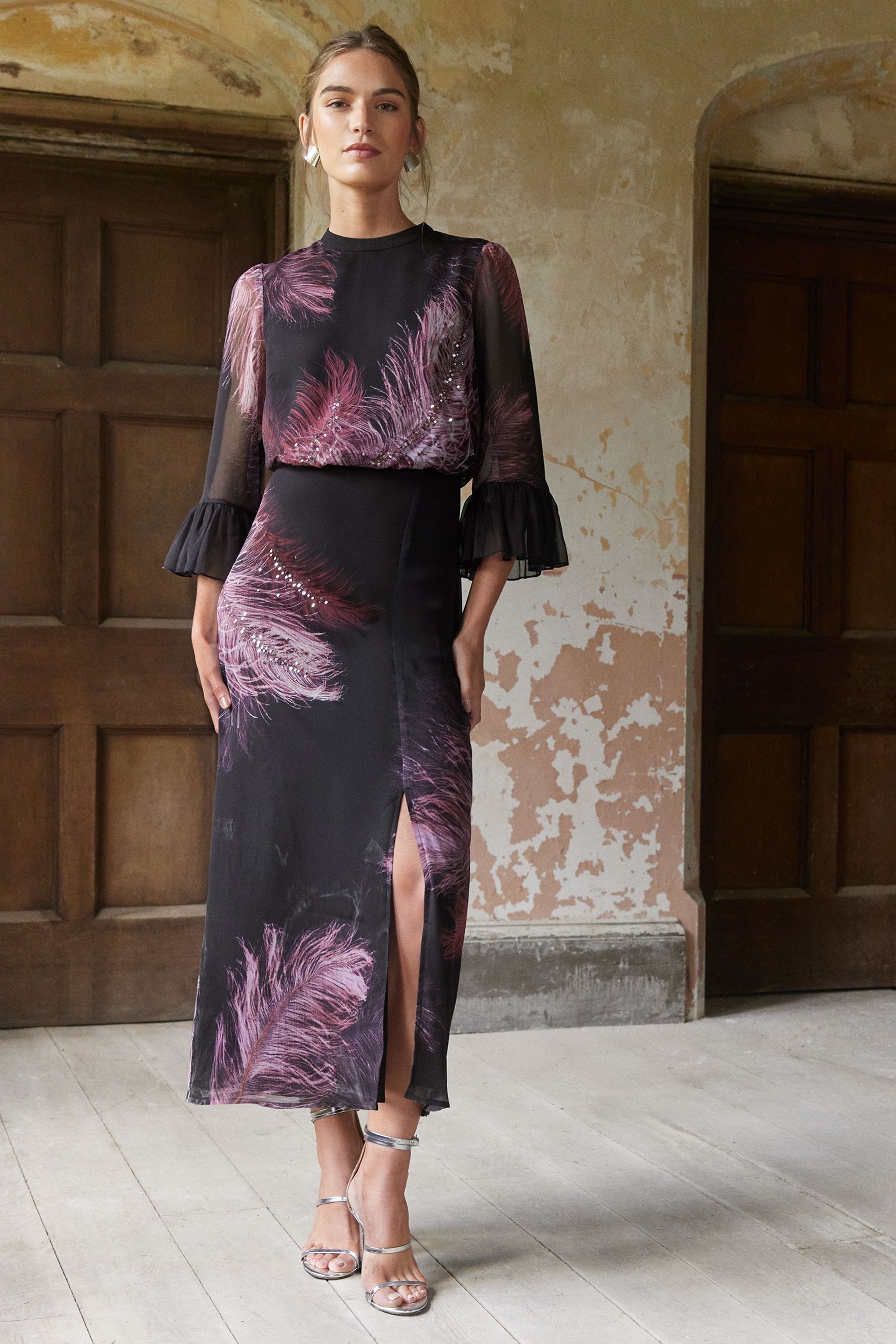 Buy Love Roses Purple Petite Flute Sleeve Feather Print Midi Dress from Next Belgium