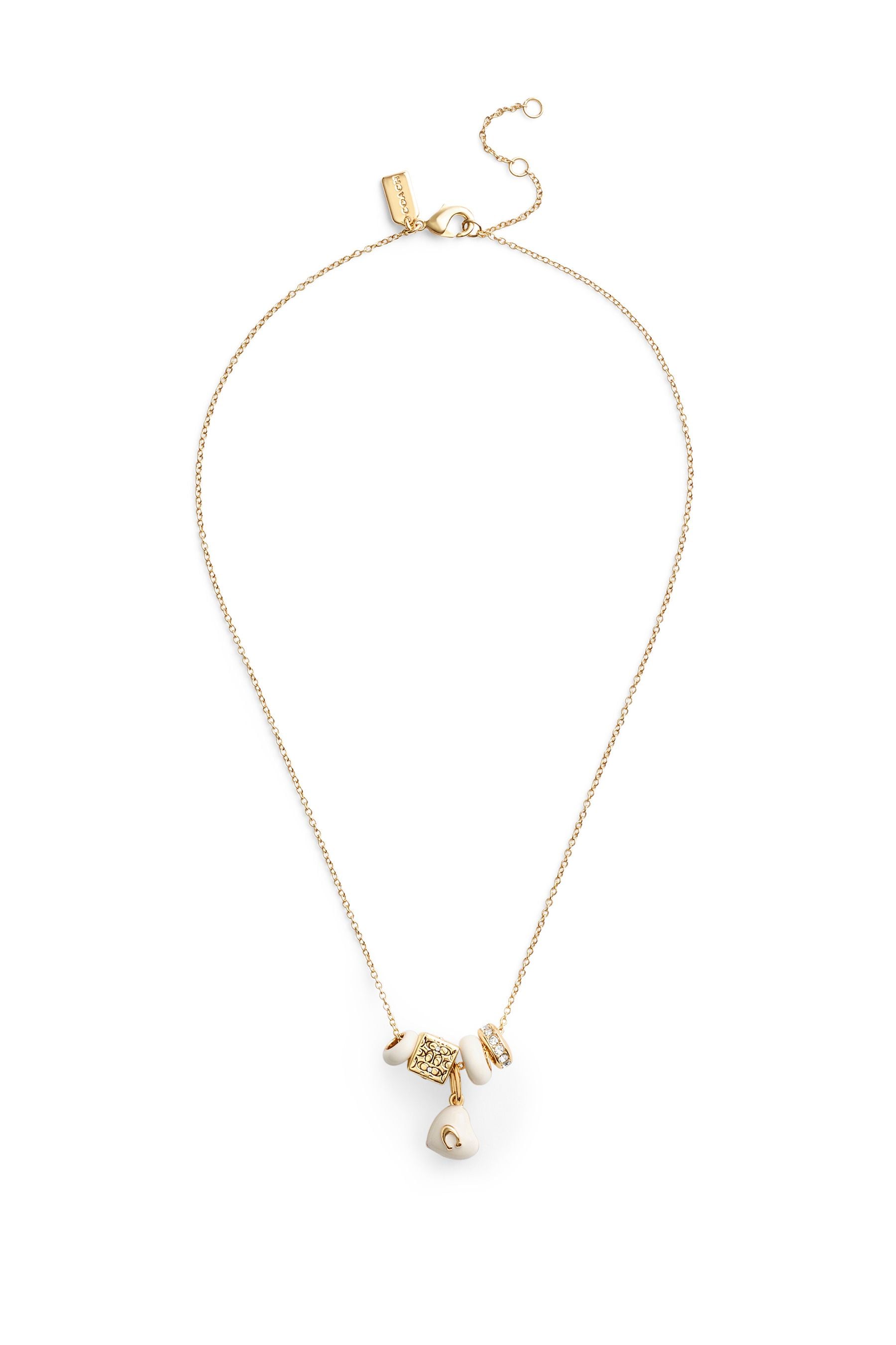 Coach charm necklace top