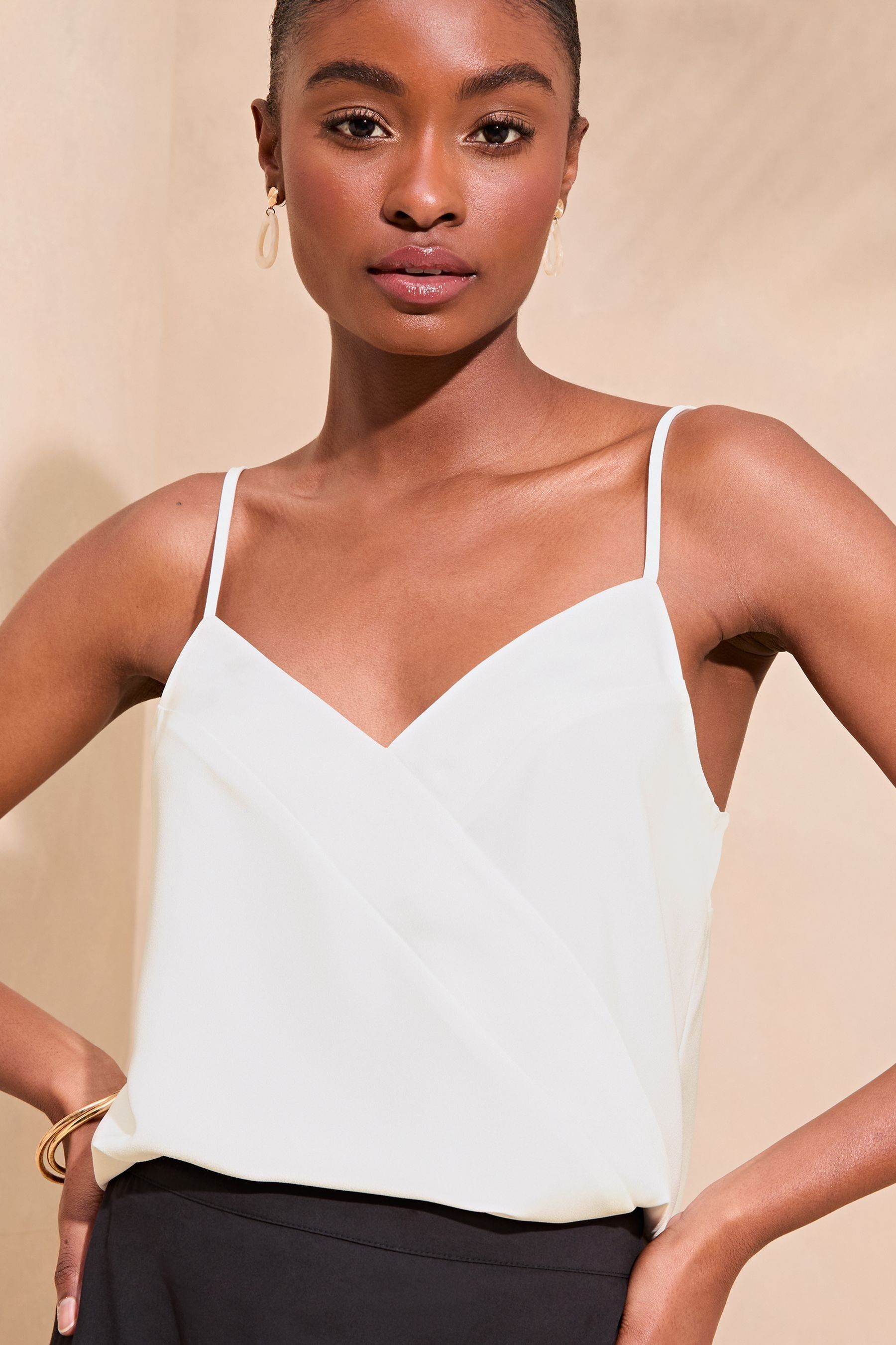 Buy Lipsy Ivory White Satin Panel Cami Vest Top from the Next UK online shop