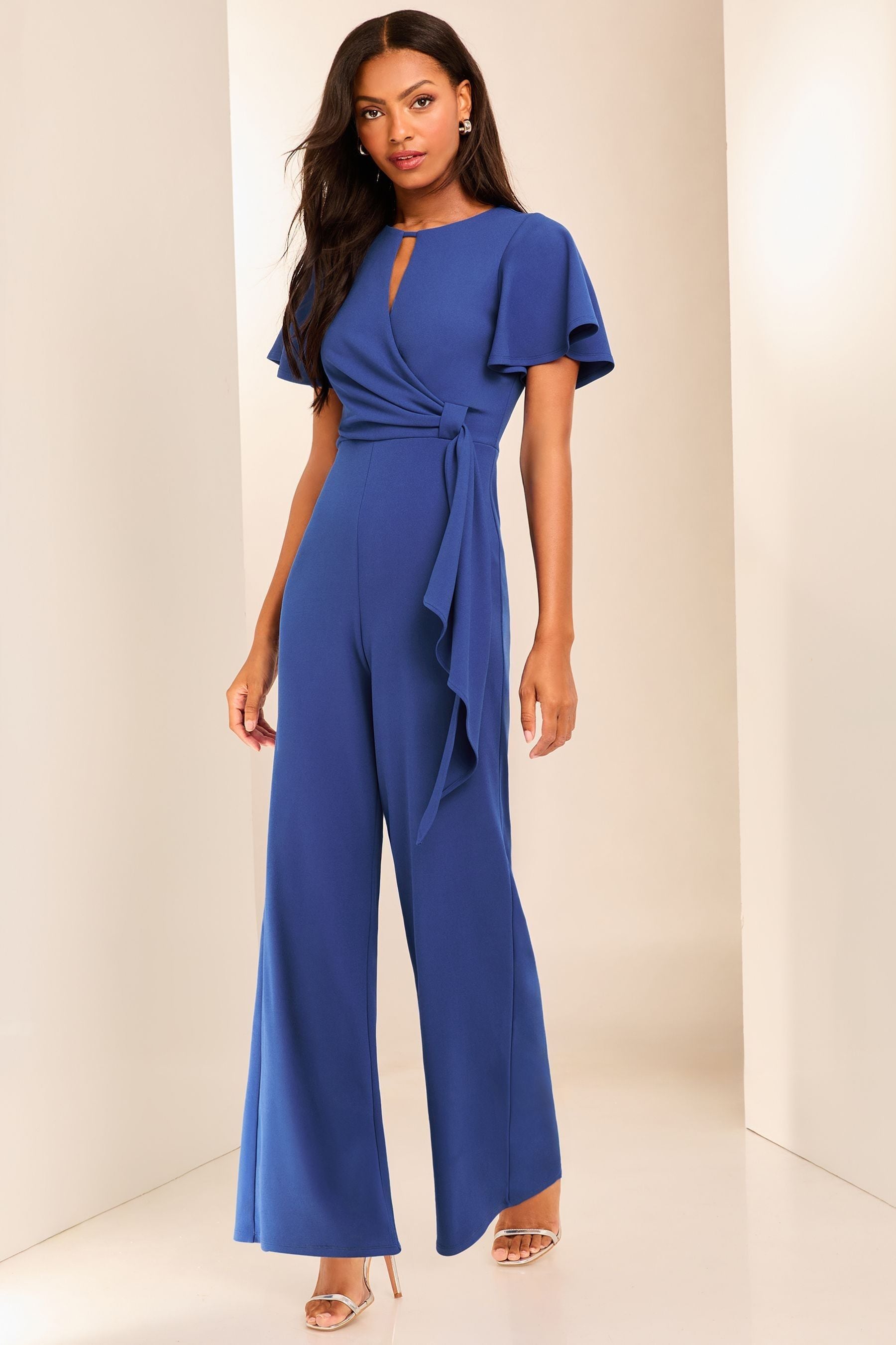Buy Lipsy Blue Flutter Sleeve Tie Side Wide Leg Jumpsuit from Next Slovakia