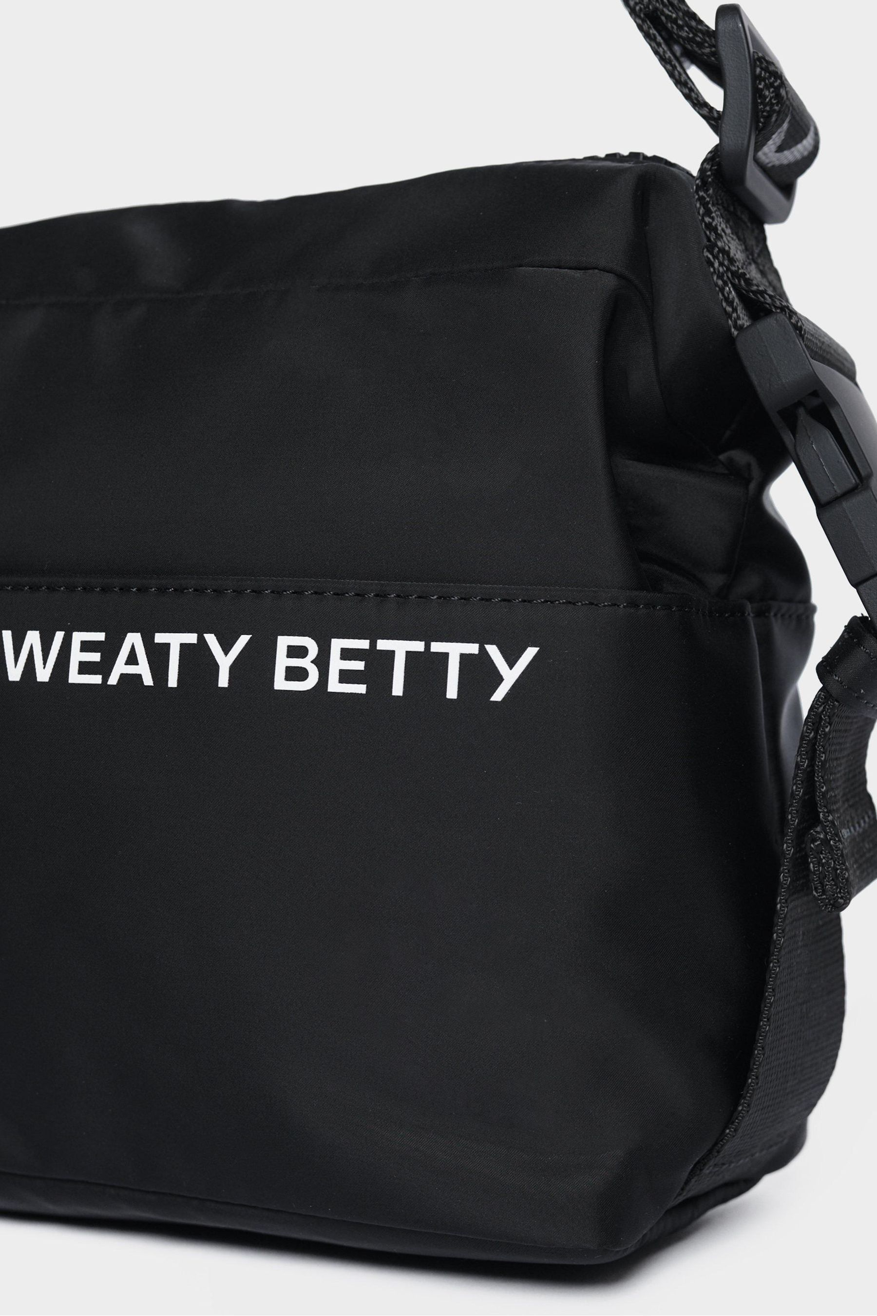 Buy Sweaty Betty Black Strive Cross Body Bag from Next Poland