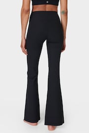 Sweaty Betty Black Glow Flex Rib Flare Trousers - Image 2 of 7