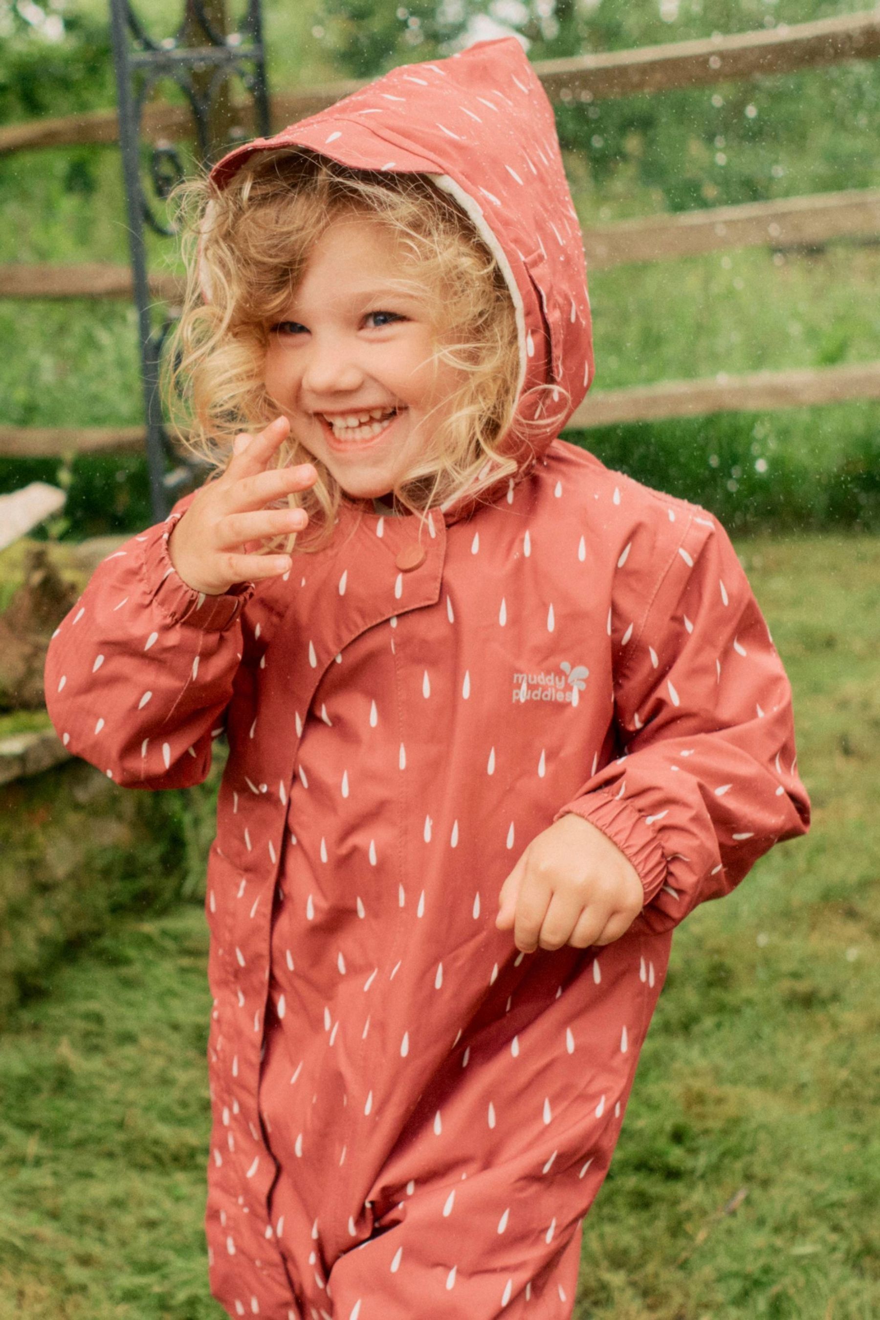 Muddy puddles raincoat top