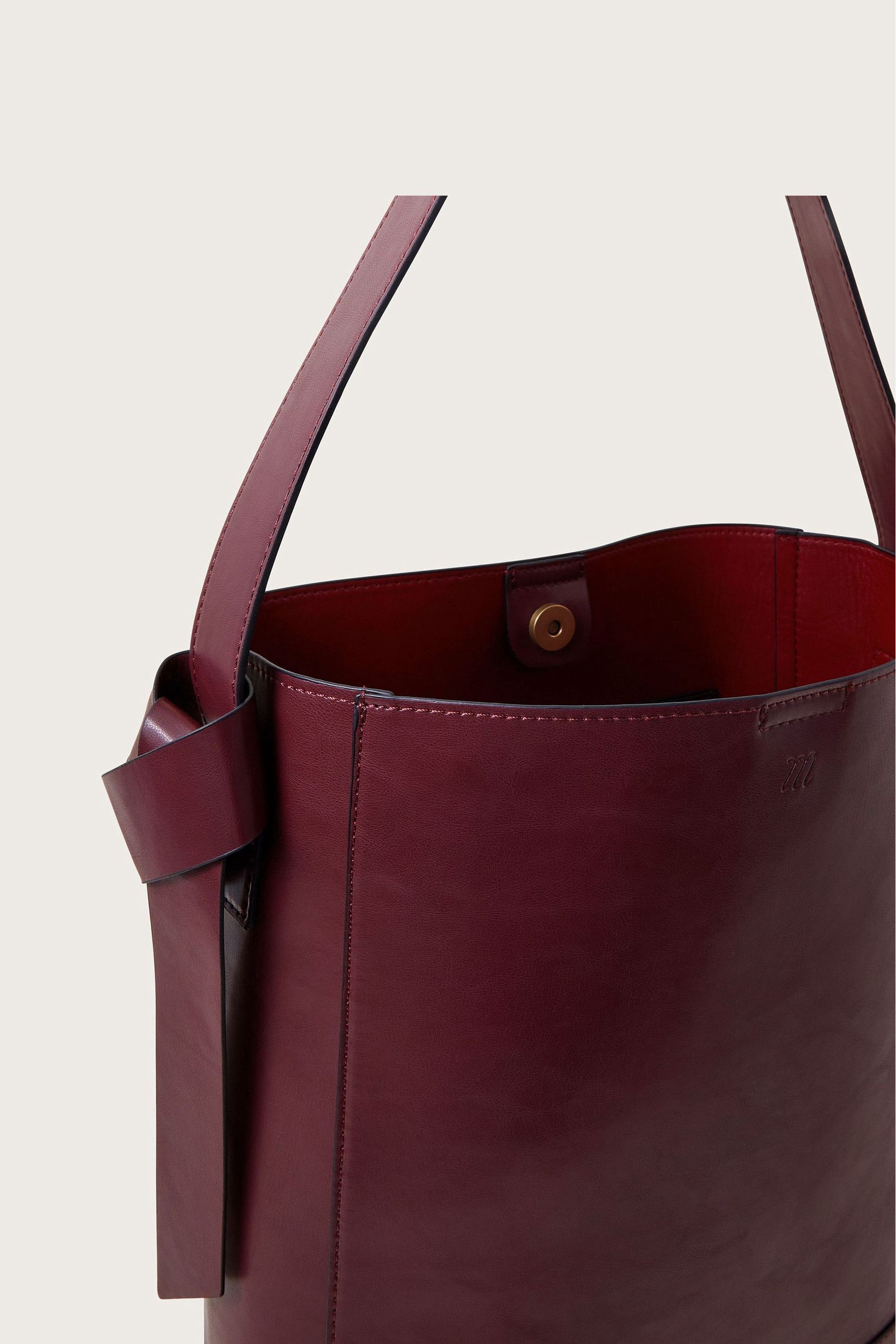 Monsoon leather bag outlet