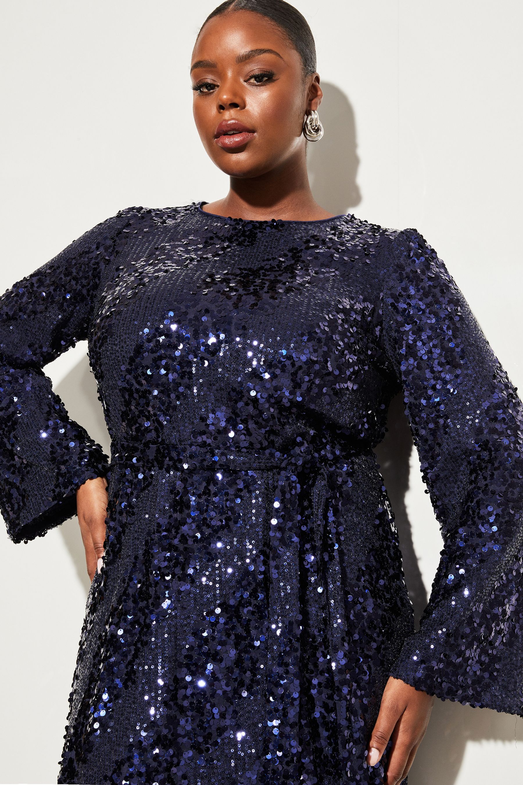 Buy Lipsy Navy Blue Curve Long Sleeve Round Neck Sequin Belted Shift Dress from Next Luxembourg