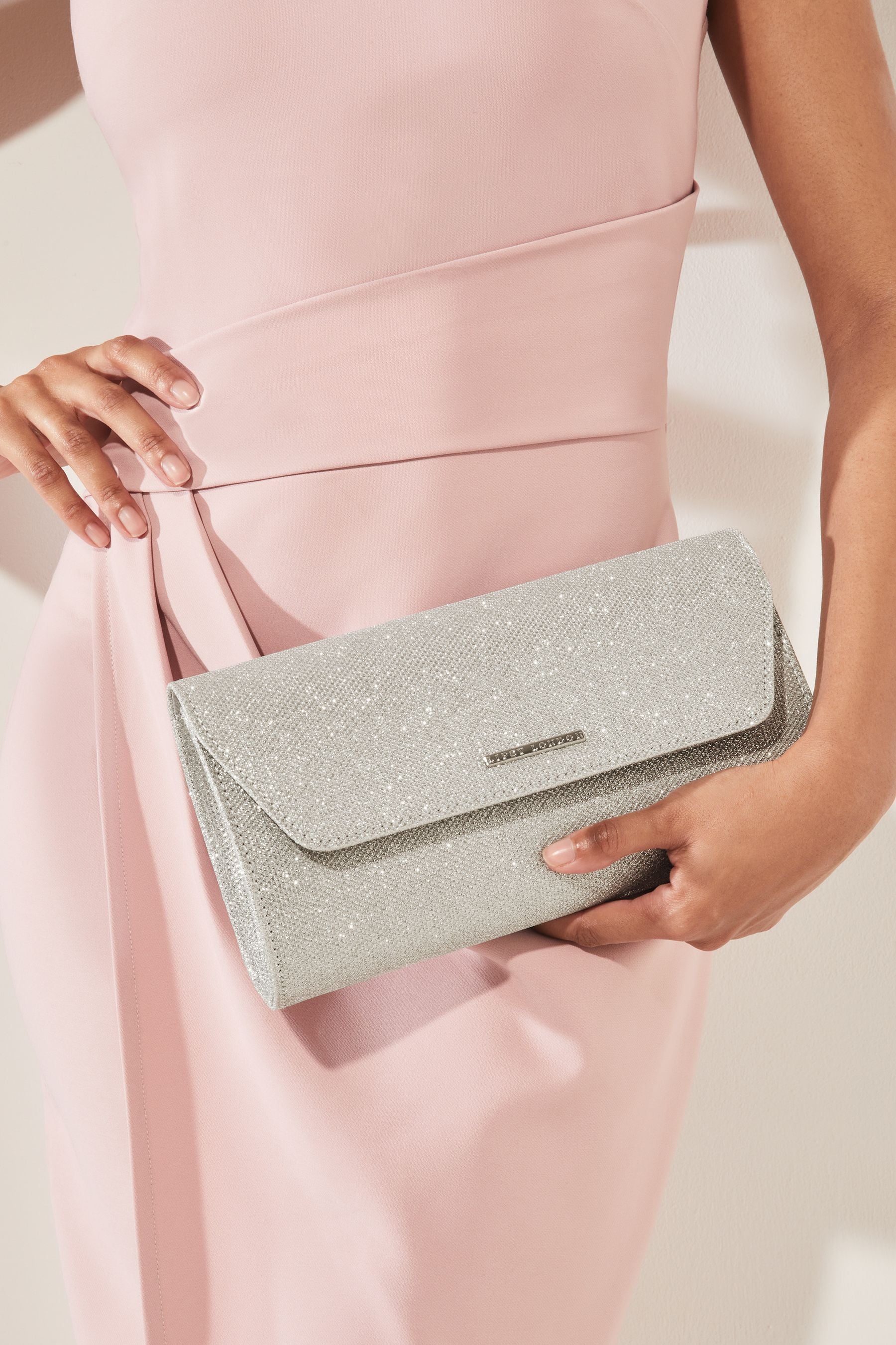 Pink glitter clutch bag deals