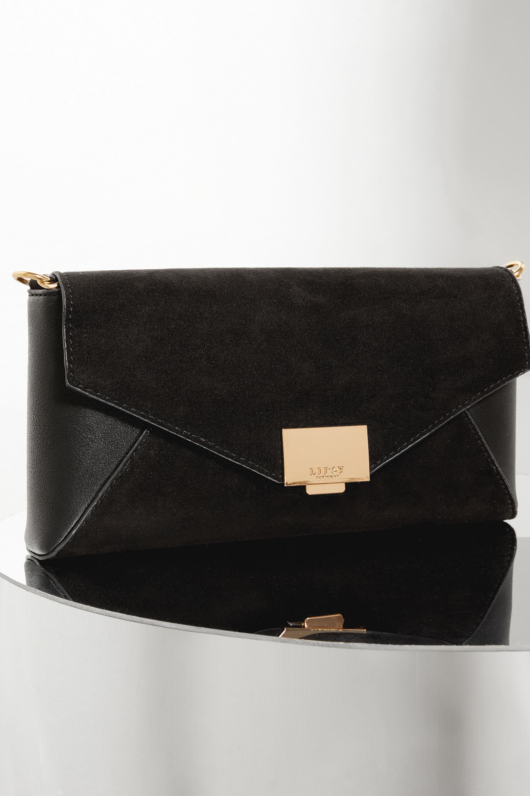 Buy Lipsy Black Black Foldover Clutch Bag from Next Ireland