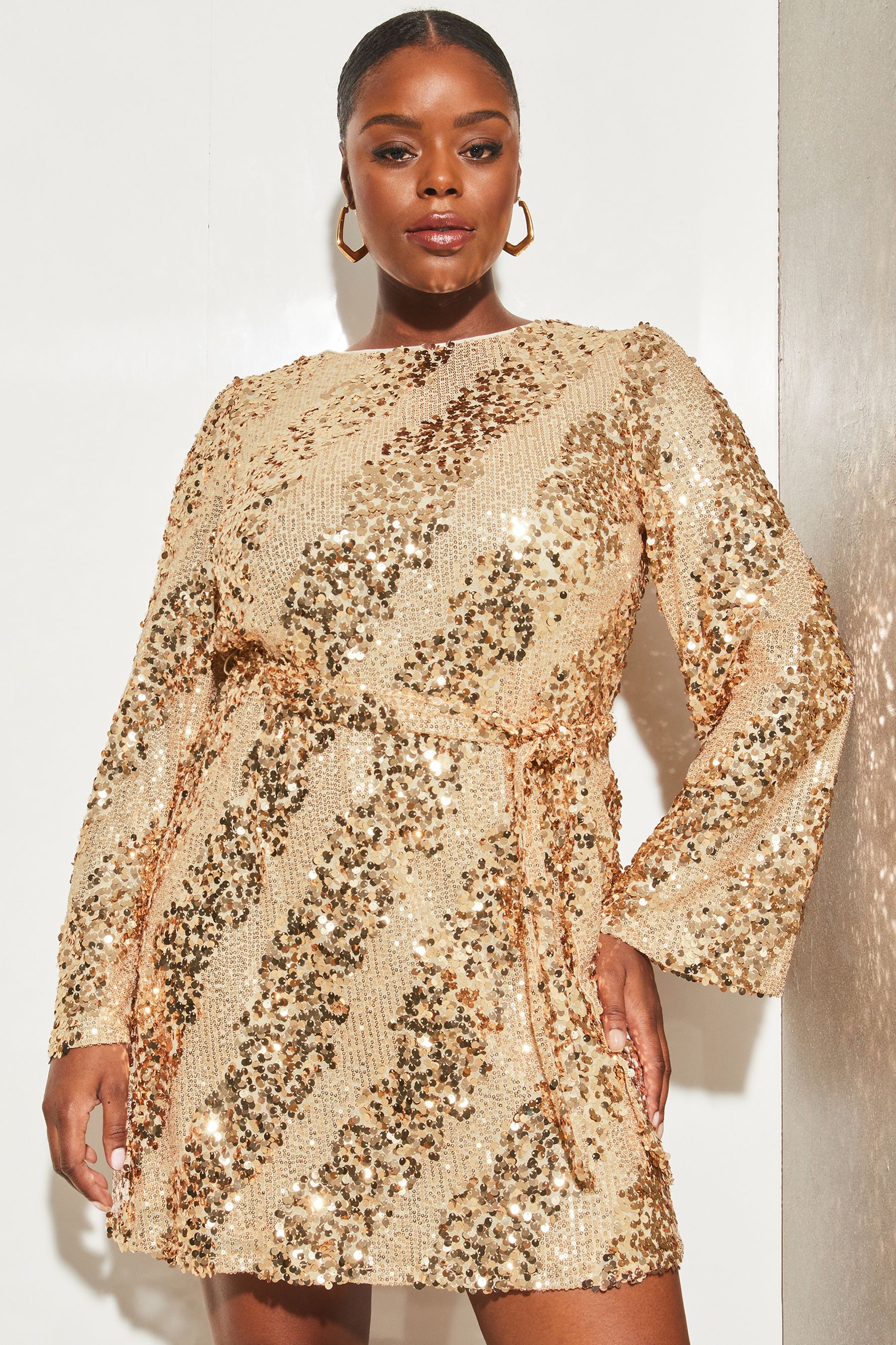 Buy Lipsy Gold Curve Long Sleeve Round Neck Sequin Belted Shift Dress from Next Luxembourg