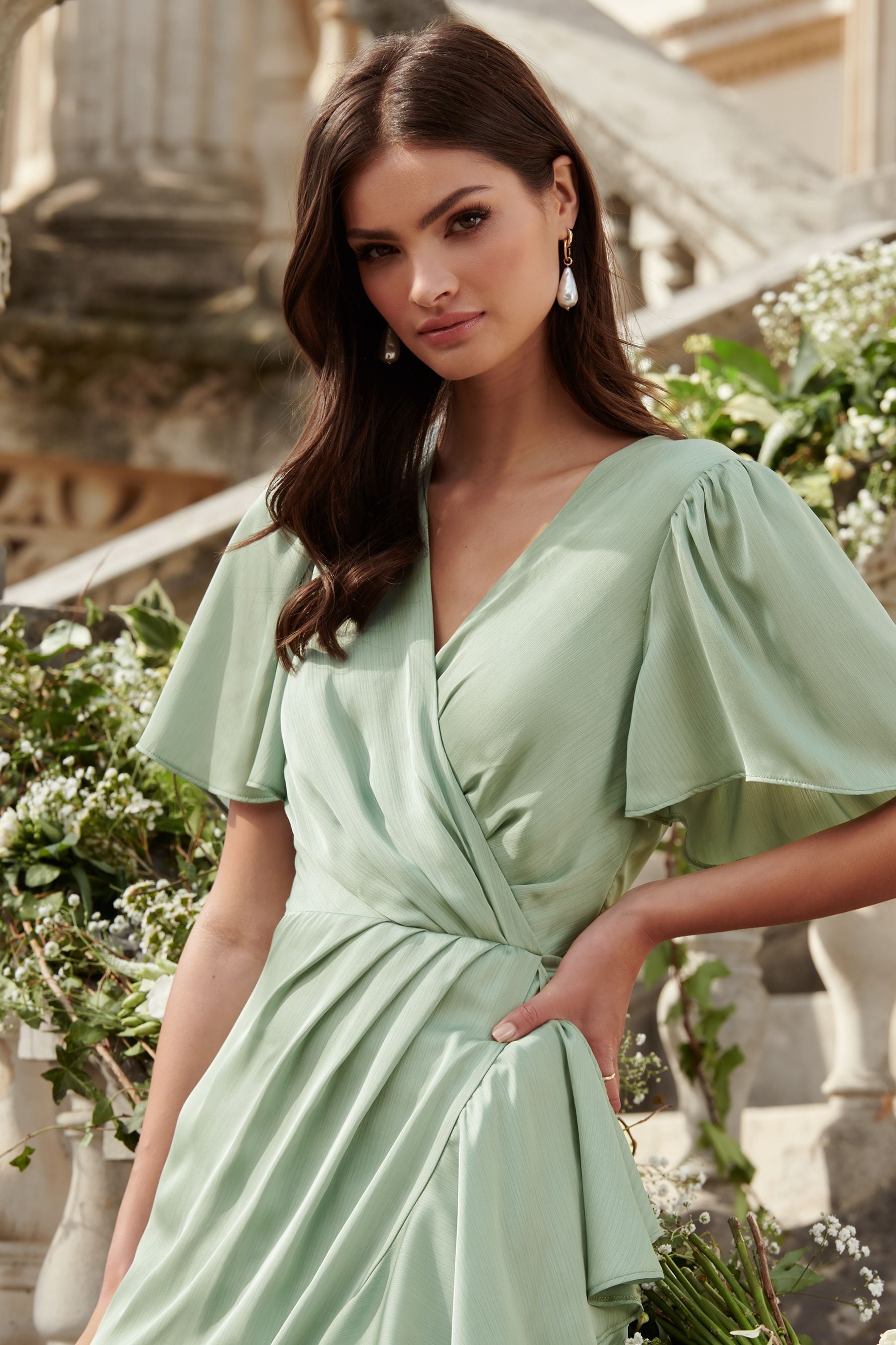 Buy Lipsy Sage Flutter Sleeve Wrap Front Bridesmaid Maxi Dress from Next Luxembourg