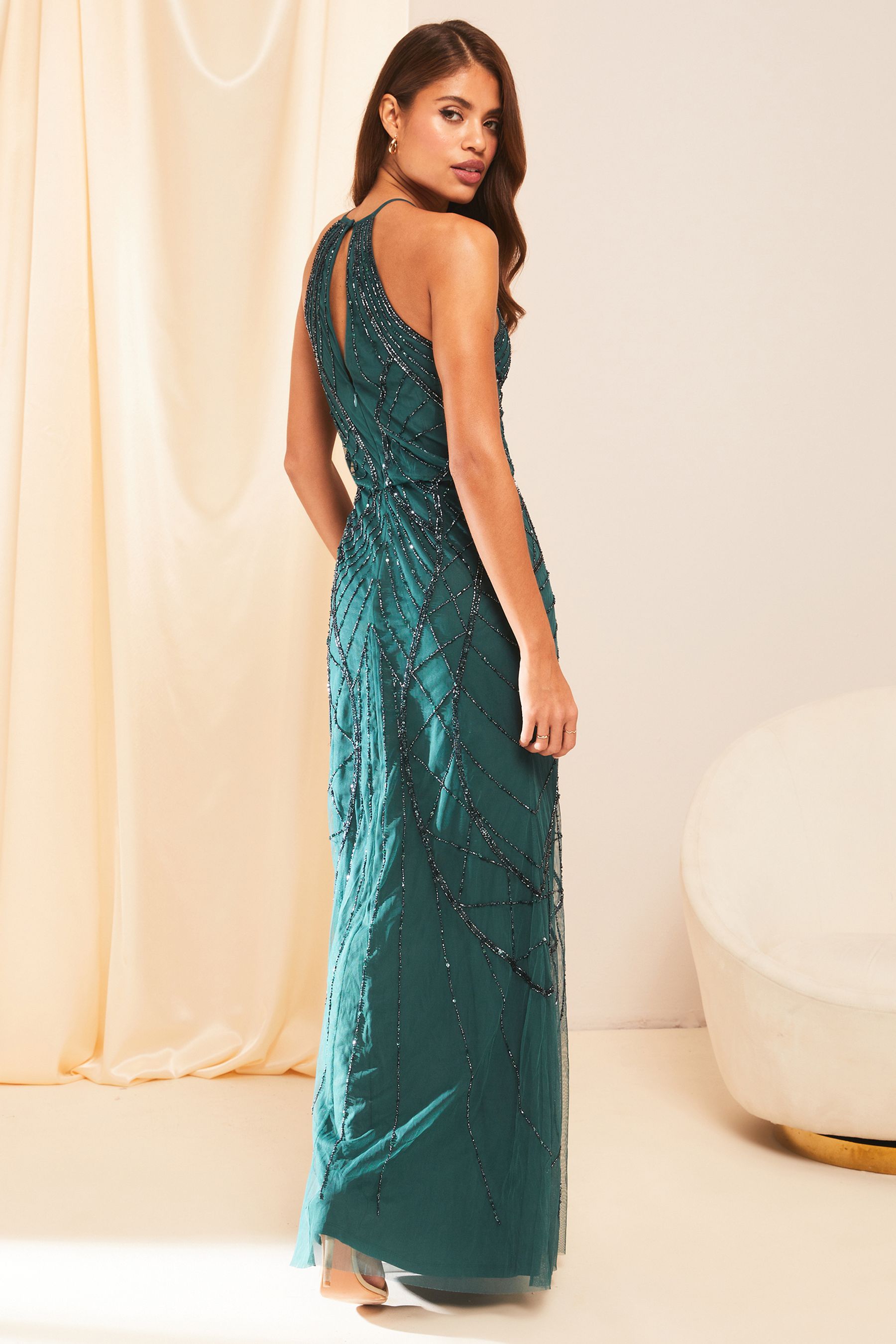 Buy Lipsy Forrest Green Petite Kate Hand Embellished Sequin Halter Bridesmaid Maxi Dress from Next Luxembourg