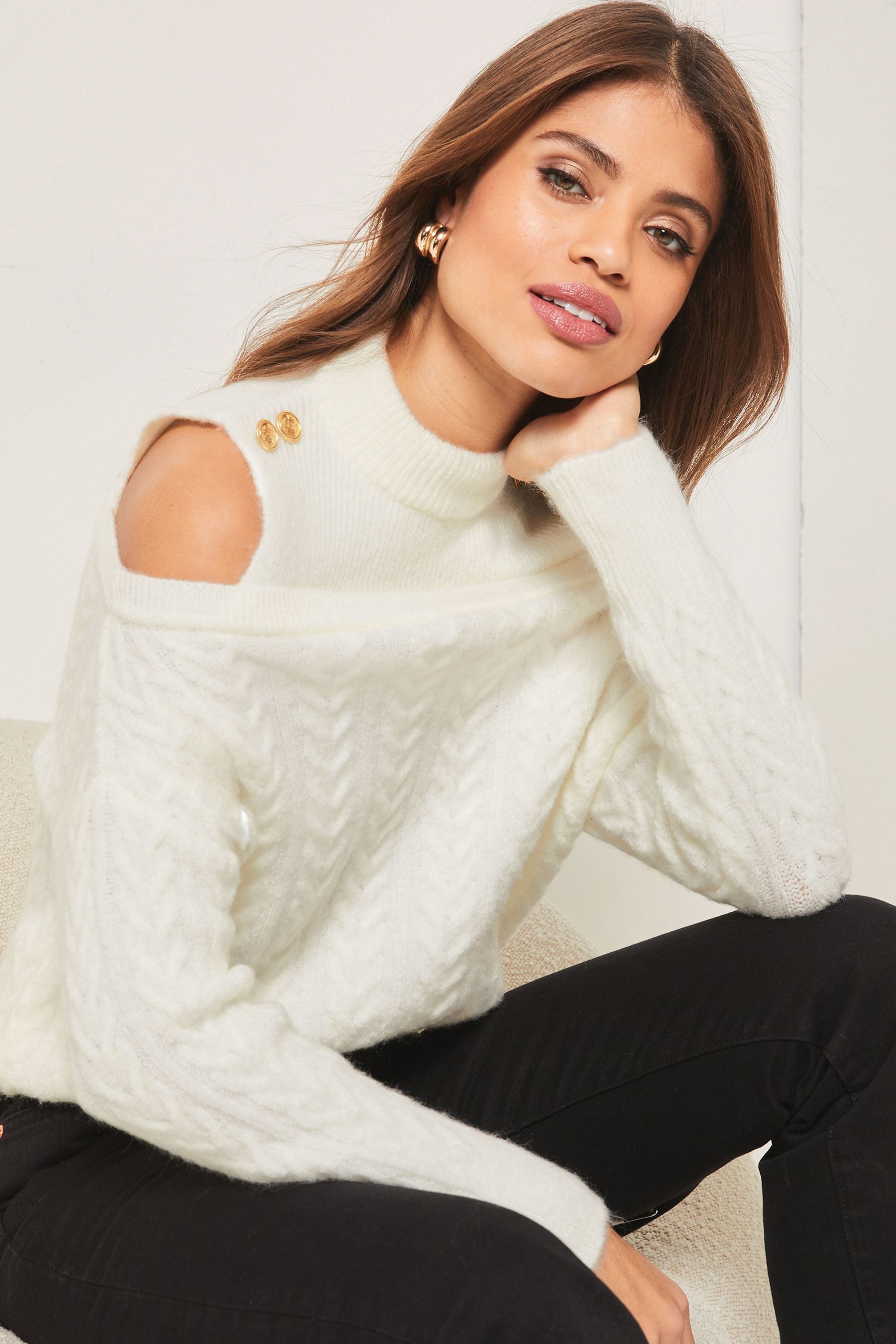 Buy Lipsy Cream Cold Shoulder High Neck Knitted Ribbed Jumper from Next Luxembourg