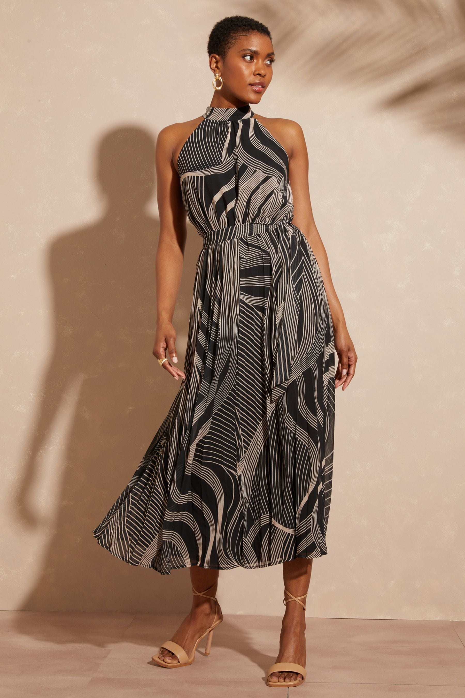 Buy Love Roses Black Linear Printed Halter Pleated Belted Midi Dress from Next Luxembourg