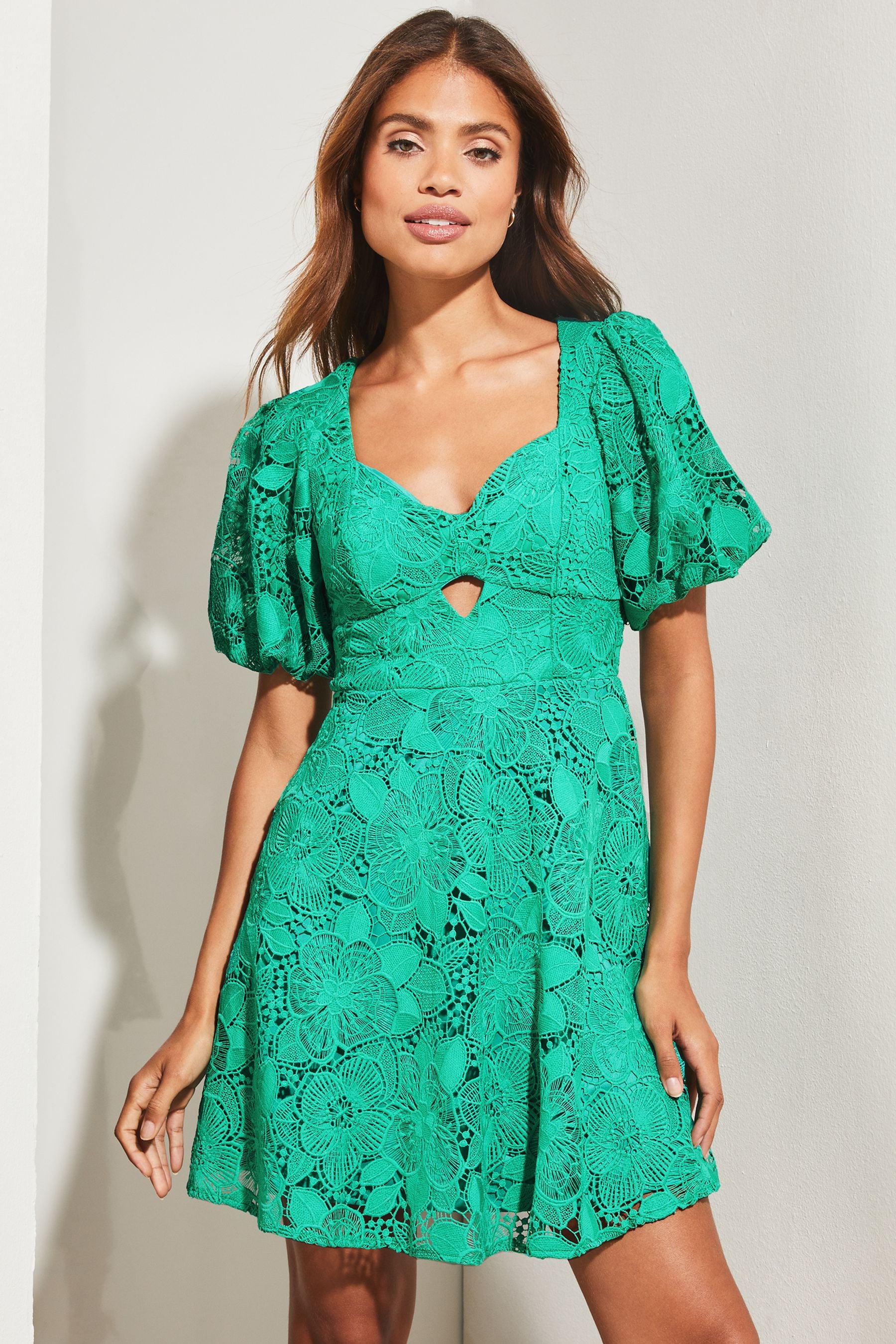 Buy Lipsy Green Lace Sweetheart Puff Sleeve Mini Skater Dress from Next Luxembourg