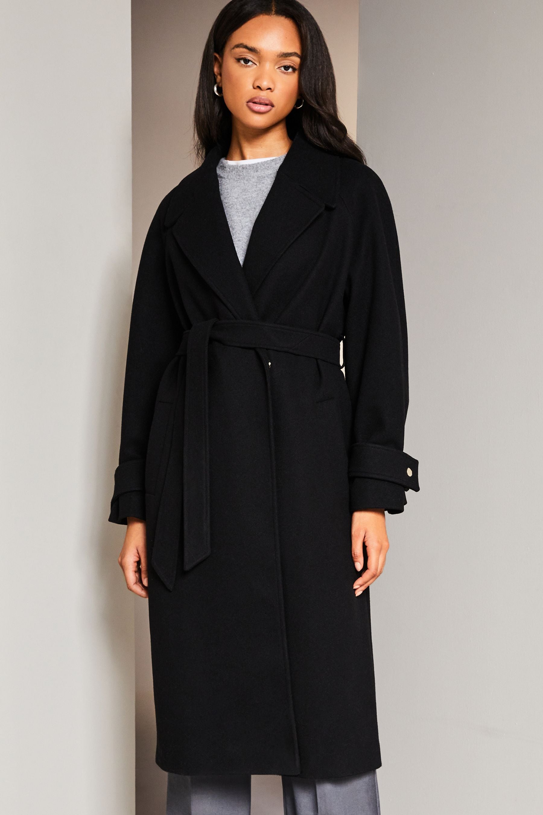 Black belted wrap coat sales