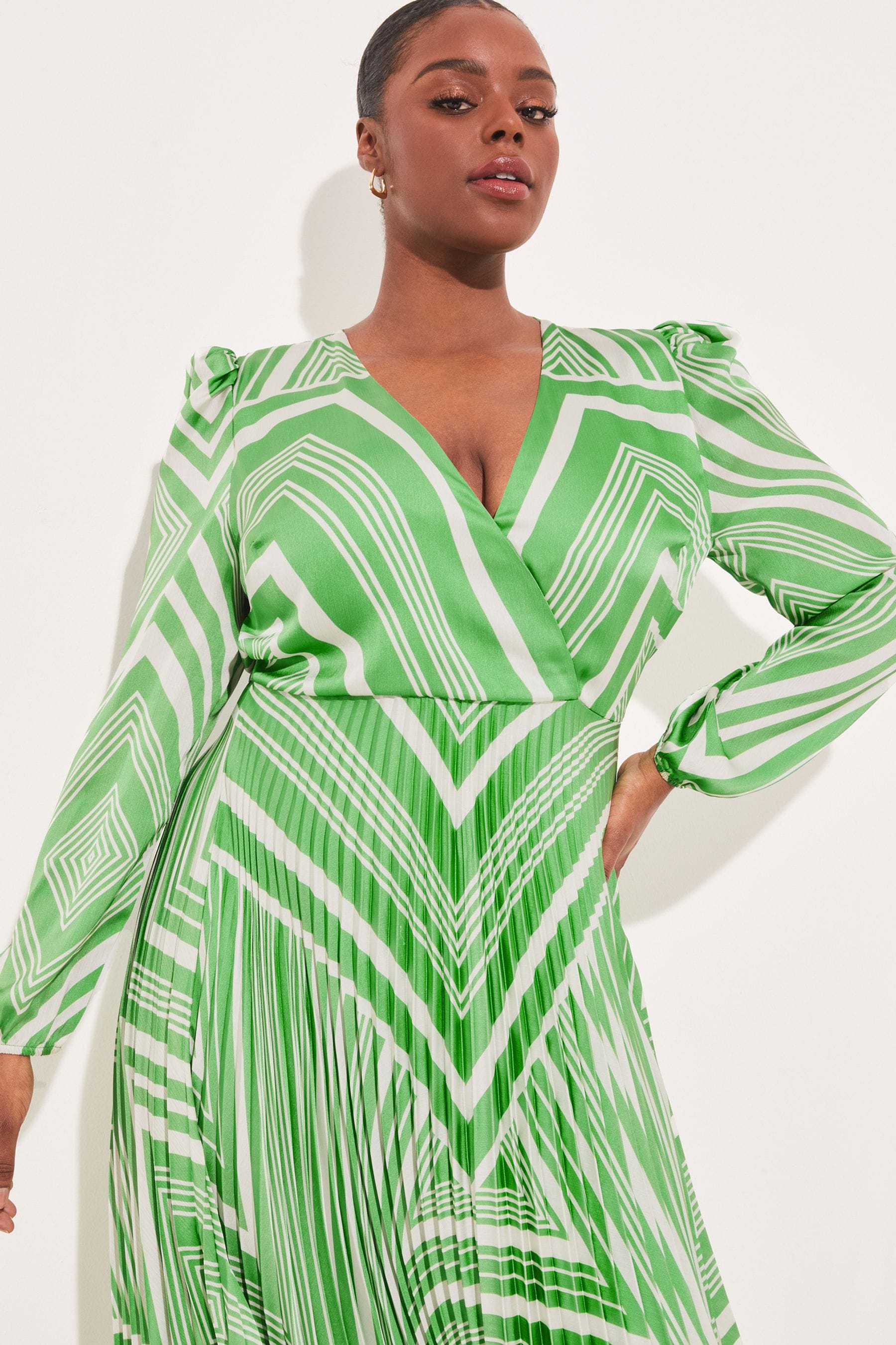 Buy Lipsy Green Print Curve Long Sleeve Pleated Wrap Midi Dress from Next Luxembourg