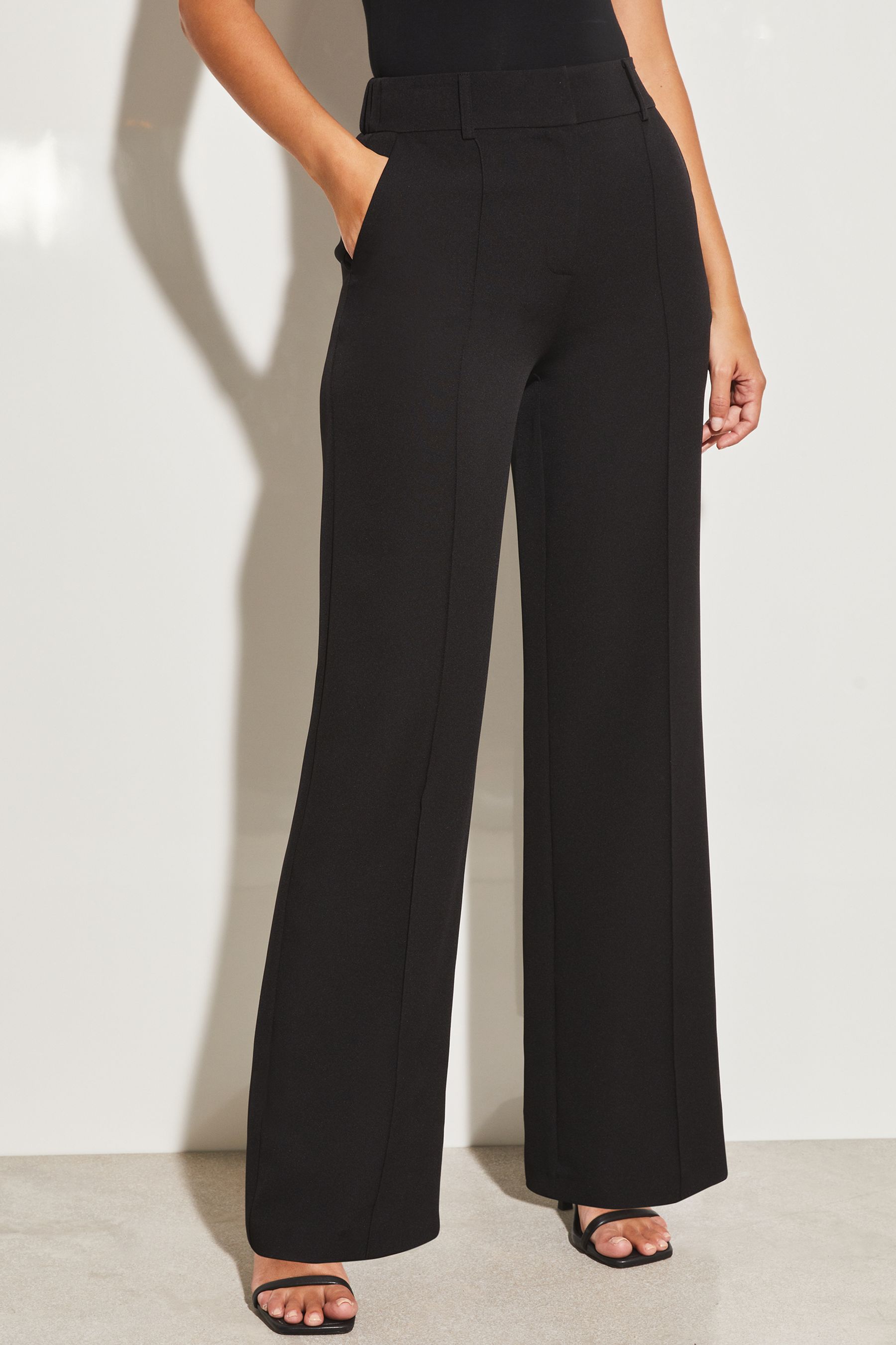 Buy Lipsy Black Petite Wide Leg Woven Smart Trousers from the Next UK online shop